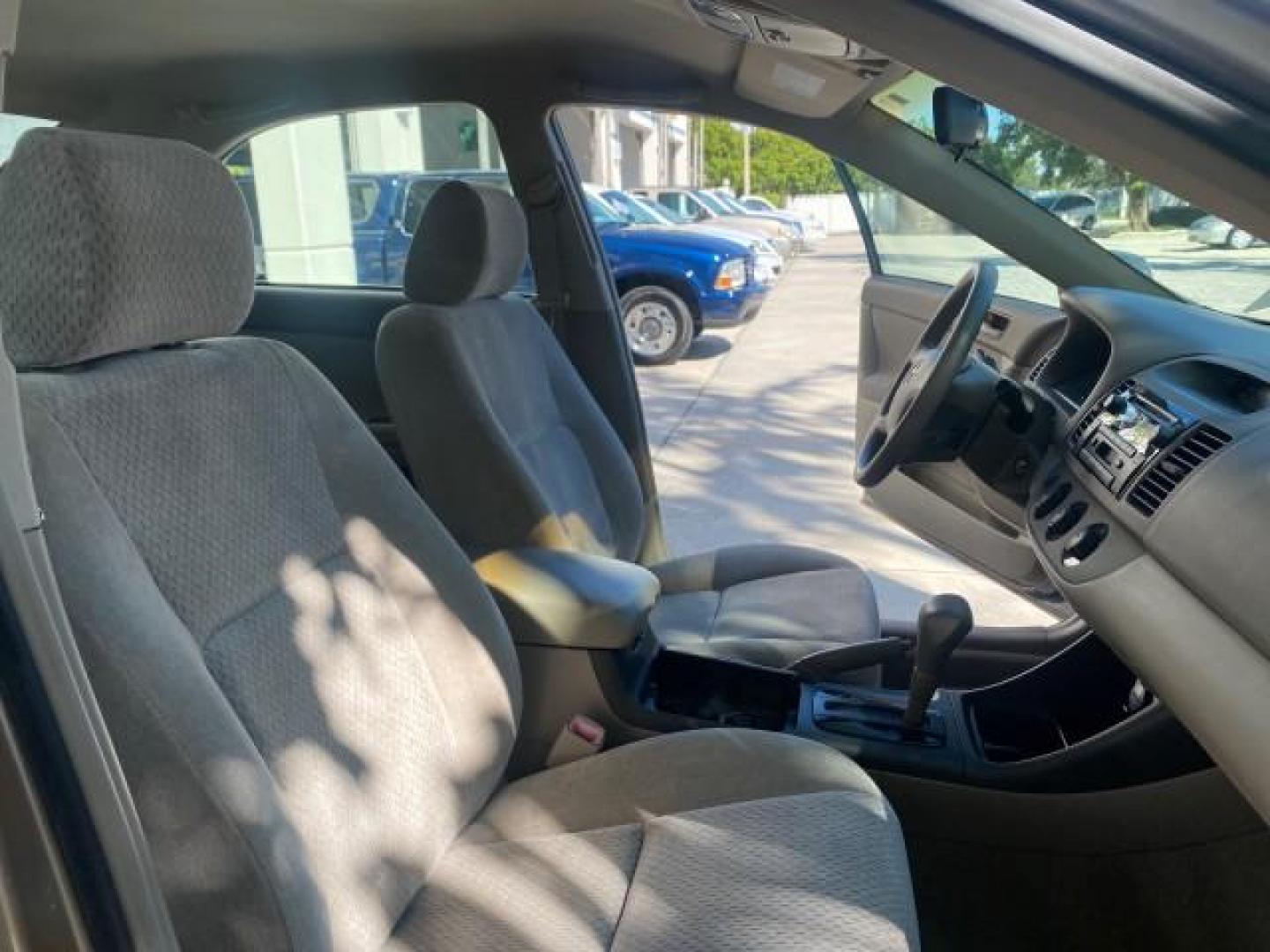 2004 Desert Sand Mica /Taupe Toyota Camry LE LOW MILES 25,414 ACTUAL (4T1BE32K04U) with an 2.4L DOHC MPFI Vvti 16-Valve 4-Cyl Engine engine, Automatic transmission, located at 4701 North Dixie Hwy, Pompano Beach, FL, 33064, (954) 422-2889, 26.240938, -80.123474 - OUR WEBPAGE FLORIDACARS1.COM HAS OVER 100 PHOTOS AND FREE CARFAX LINK 2004 TOYOTA CAMRY LE VIN: 4T1BE32K04U806344 4 T 1 B E 3 2 K 0 4 U 8 0 6 3 4 4 SEDAN 4 DR 2.4L I4 F DOHC 16V GASOLINE 32 MPG FRONT WHEEL DRIVE Features ABS Brakes Air Conditioning AM/FM Stereo Automatic Transmission Cassette Player - Photo#12