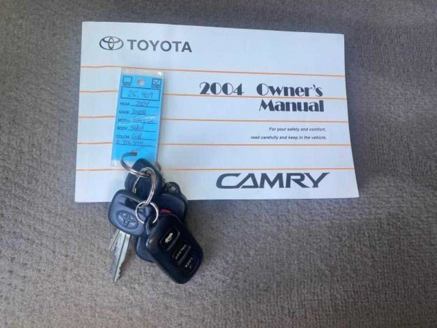 2004 Desert Sand Mica /Taupe Toyota Camry LE LOW MILES 25,414 ACTUAL (4T1BE32K04U) with an 2.4L DOHC MPFI Vvti 16-Valve 4-Cyl Engine engine, Automatic transmission, located at 4701 North Dixie Hwy, Pompano Beach, FL, 33064, (954) 422-2889, 26.240938, -80.123474 - OUR WEBPAGE FLORIDACARS1.COM HAS OVER 100 PHOTOS AND FREE CARFAX LINK 2004 TOYOTA CAMRY LE VIN: 4T1BE32K04U806344 4 T 1 B E 3 2 K 0 4 U 8 0 6 3 4 4 SEDAN 4 DR 2.4L I4 F DOHC 16V GASOLINE 32 MPG FRONT WHEEL DRIVE Features ABS Brakes Air Conditioning AM/FM Stereo Automatic Transmission Cassette Player - Photo#23