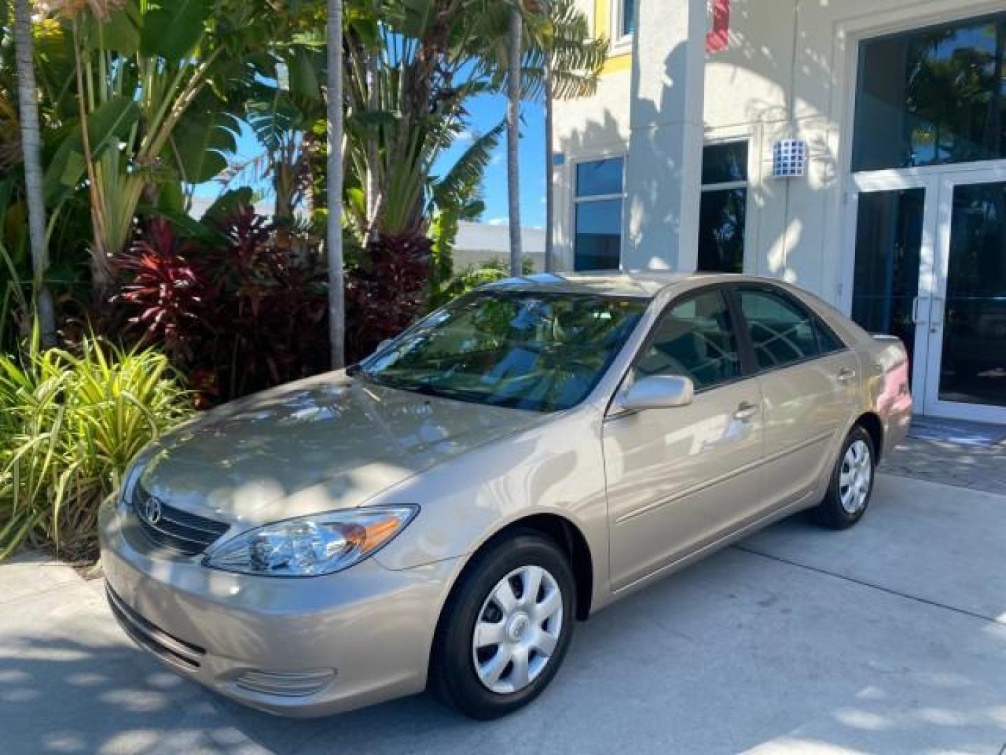2004 Desert Sand Mica /Taupe Toyota Camry LE LOW MILES 25,414 ACTUAL (4T1BE32K04U) with an 2.4L DOHC MPFI Vvti 16-Valve 4-Cyl Engine engine, Automatic transmission, located at 4701 North Dixie Hwy, Pompano Beach, FL, 33064, (954) 422-2889, 26.240938, -80.123474 - OUR WEBPAGE FLORIDACARS1.COM HAS OVER 100 PHOTOS AND FREE CARFAX LINK 2004 TOYOTA CAMRY LE VIN: 4T1BE32K04U806344 4 T 1 B E 3 2 K 0 4 U 8 0 6 3 4 4 SEDAN 4 DR 2.4L I4 F DOHC 16V GASOLINE 32 MPG FRONT WHEEL DRIVE Features ABS Brakes Air Conditioning AM/FM Stereo Automatic Transmission Cassette Player - Photo#30
