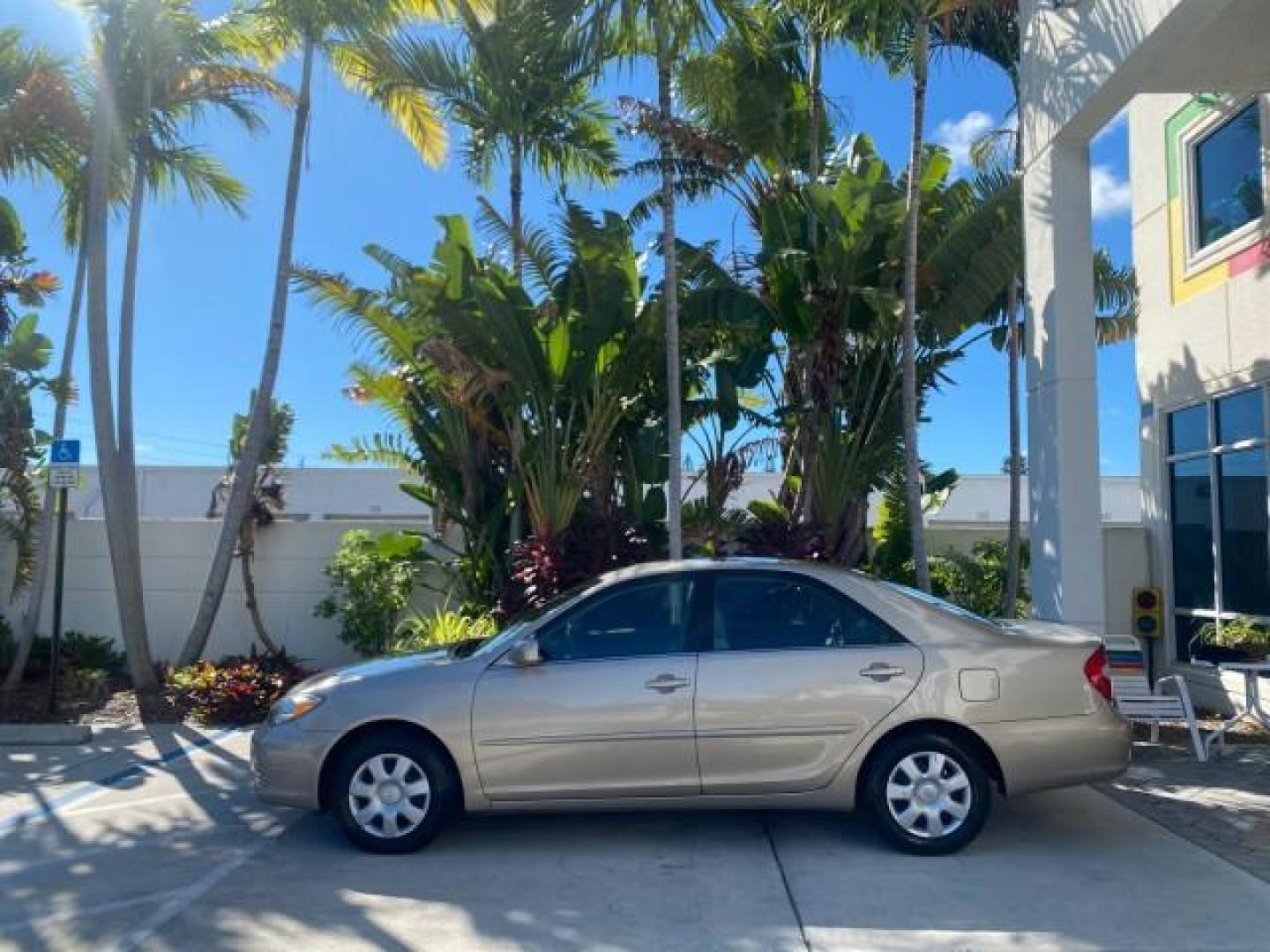 2004 Desert Sand Mica /Taupe Toyota Camry LE LOW MILES 25,414 ACTUAL (4T1BE32K04U) with an 2.4L DOHC MPFI Vvti 16-Valve 4-Cyl Engine engine, Automatic transmission, located at 4701 North Dixie Hwy, Pompano Beach, FL, 33064, (954) 422-2889, 26.240938, -80.123474 - OUR WEBPAGE FLORIDACARS1.COM HAS OVER 100 PHOTOS AND FREE CARFAX LINK 2004 TOYOTA CAMRY LE VIN: 4T1BE32K04U806344 4 T 1 B E 3 2 K 0 4 U 8 0 6 3 4 4 SEDAN 4 DR 2.4L I4 F DOHC 16V GASOLINE 32 MPG FRONT WHEEL DRIVE Features ABS Brakes Air Conditioning AM/FM Stereo Automatic Transmission Cassette Player - Photo#31