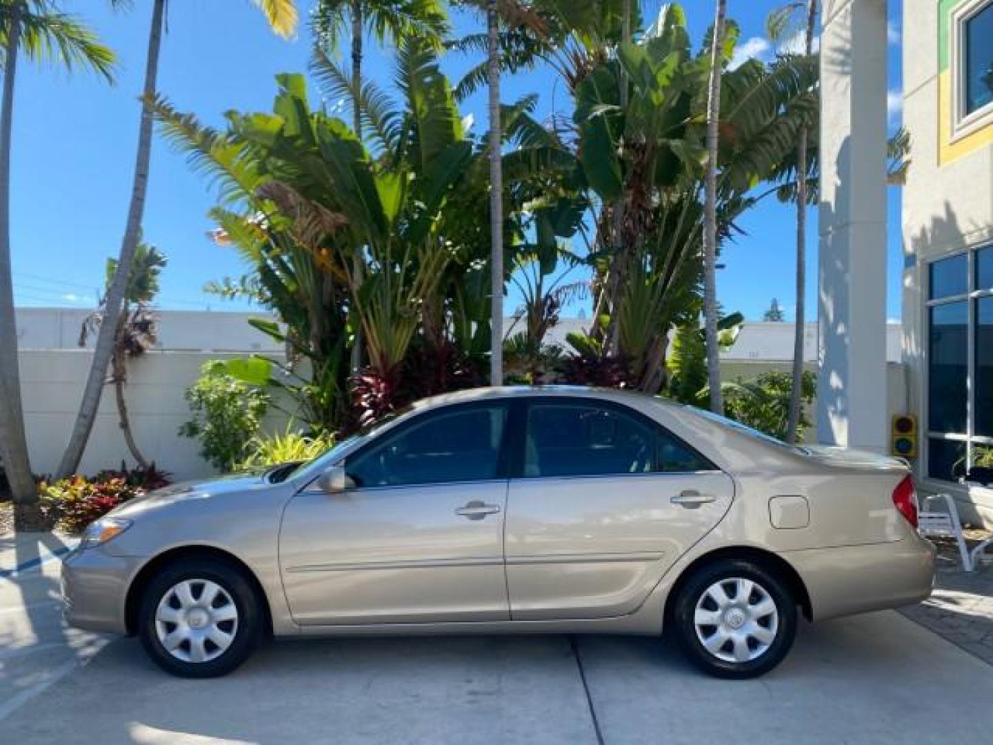 2004 Desert Sand Mica /Taupe Toyota Camry LE LOW MILES 25,414 ACTUAL (4T1BE32K04U) with an 2.4L DOHC MPFI Vvti 16-Valve 4-Cyl Engine engine, Automatic transmission, located at 4701 North Dixie Hwy, Pompano Beach, FL, 33064, (954) 422-2889, 26.240938, -80.123474 - OUR WEBPAGE FLORIDACARS1.COM HAS OVER 100 PHOTOS AND FREE CARFAX LINK 2004 TOYOTA CAMRY LE VIN: 4T1BE32K04U806344 4 T 1 B E 3 2 K 0 4 U 8 0 6 3 4 4 SEDAN 4 DR 2.4L I4 F DOHC 16V GASOLINE 32 MPG FRONT WHEEL DRIVE Features ABS Brakes Air Conditioning AM/FM Stereo Automatic Transmission Cassette Player - Photo#32