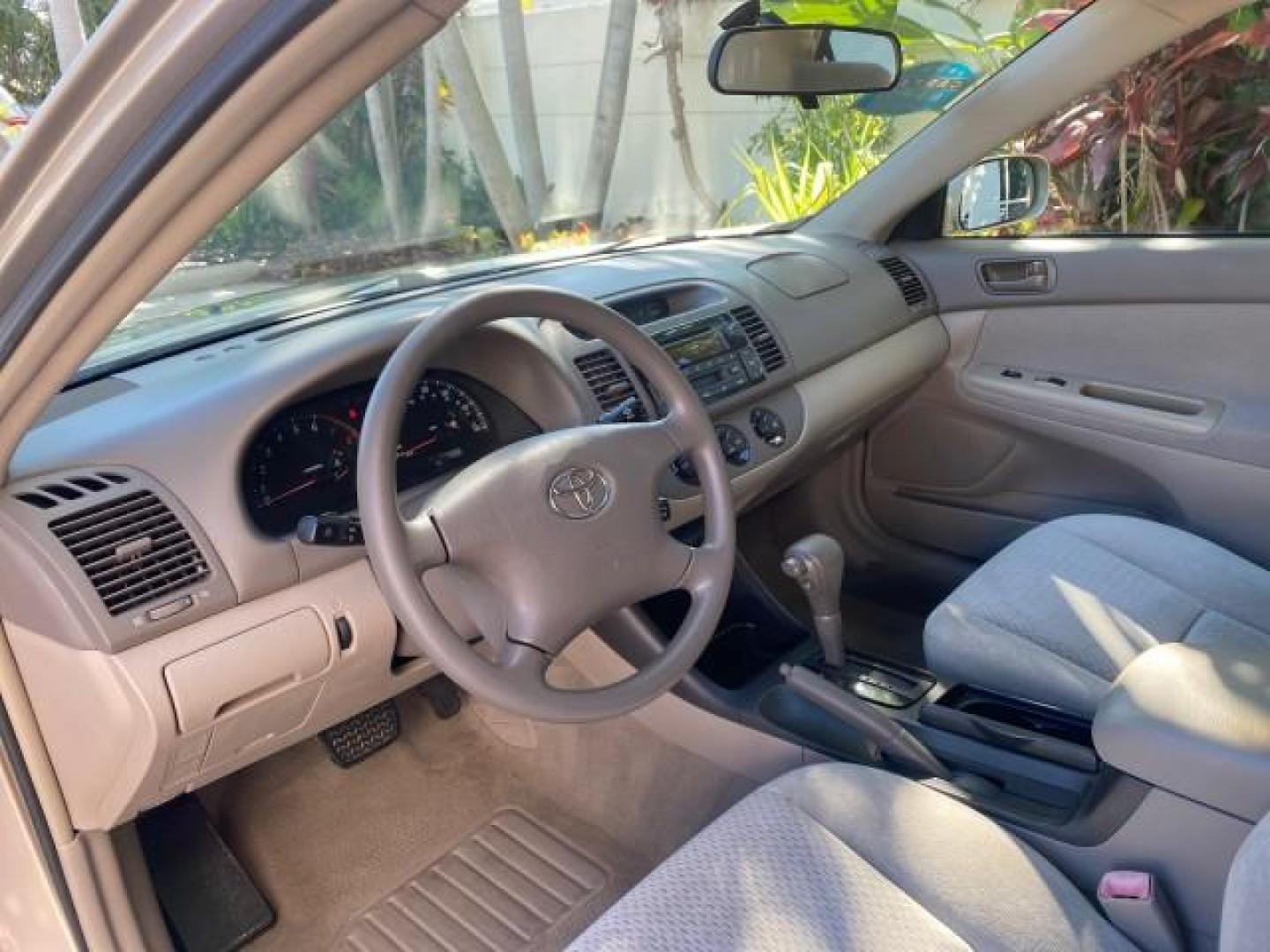 2004 Desert Sand Mica /Taupe Toyota Camry LE LOW MILES 25,414 ACTUAL (4T1BE32K04U) with an 2.4L DOHC MPFI Vvti 16-Valve 4-Cyl Engine engine, Automatic transmission, located at 4701 North Dixie Hwy, Pompano Beach, FL, 33064, (954) 422-2889, 26.240938, -80.123474 - OUR WEBPAGE FLORIDACARS1.COM HAS OVER 100 PHOTOS AND FREE CARFAX LINK 2004 TOYOTA CAMRY LE VIN: 4T1BE32K04U806344 4 T 1 B E 3 2 K 0 4 U 8 0 6 3 4 4 SEDAN 4 DR 2.4L I4 F DOHC 16V GASOLINE 32 MPG FRONT WHEEL DRIVE Features ABS Brakes Air Conditioning AM/FM Stereo Automatic Transmission Cassette Player - Photo#49