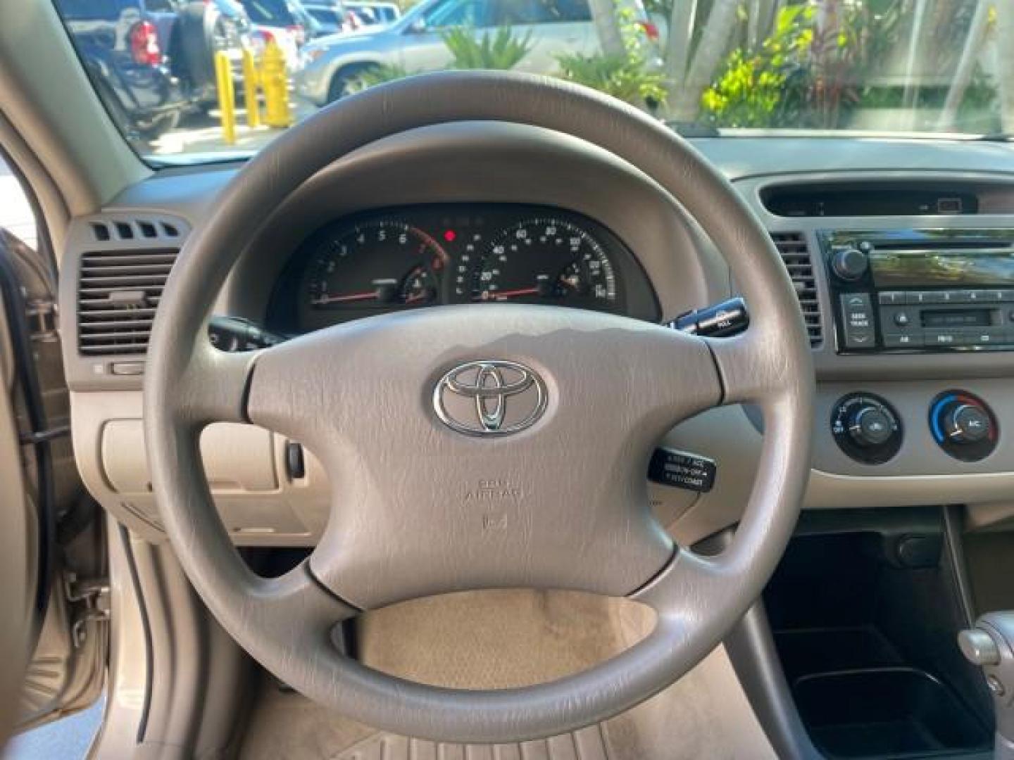 2004 Desert Sand Mica /Taupe Toyota Camry LE LOW MILES 25,414 ACTUAL (4T1BE32K04U) with an 2.4L DOHC MPFI Vvti 16-Valve 4-Cyl Engine engine, Automatic transmission, located at 4701 North Dixie Hwy, Pompano Beach, FL, 33064, (954) 422-2889, 26.240938, -80.123474 - OUR WEBPAGE FLORIDACARS1.COM HAS OVER 100 PHOTOS AND FREE CARFAX LINK 2004 TOYOTA CAMRY LE VIN: 4T1BE32K04U806344 4 T 1 B E 3 2 K 0 4 U 8 0 6 3 4 4 SEDAN 4 DR 2.4L I4 F DOHC 16V GASOLINE 32 MPG FRONT WHEEL DRIVE Features ABS Brakes Air Conditioning AM/FM Stereo Automatic Transmission Cassette Player - Photo#50