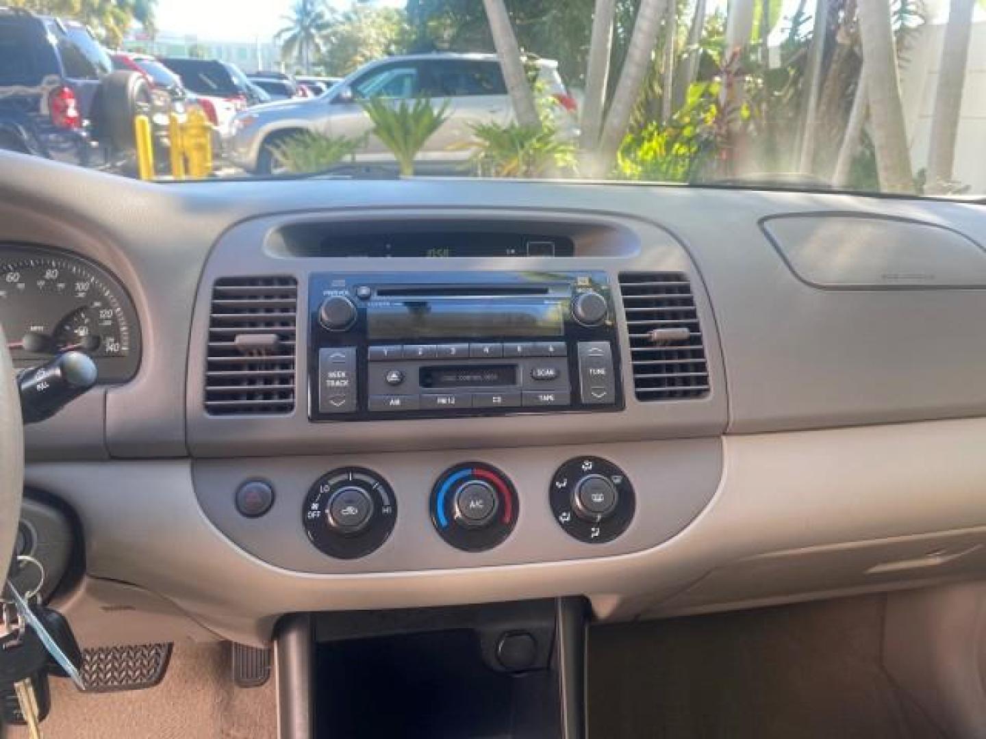 2004 Desert Sand Mica /Taupe Toyota Camry LE LOW MILES 25,414 ACTUAL (4T1BE32K04U) with an 2.4L DOHC MPFI Vvti 16-Valve 4-Cyl Engine engine, Automatic transmission, located at 4701 North Dixie Hwy, Pompano Beach, FL, 33064, (954) 422-2889, 26.240938, -80.123474 - OUR WEBPAGE FLORIDACARS1.COM HAS OVER 100 PHOTOS AND FREE CARFAX LINK 2004 TOYOTA CAMRY LE VIN: 4T1BE32K04U806344 4 T 1 B E 3 2 K 0 4 U 8 0 6 3 4 4 SEDAN 4 DR 2.4L I4 F DOHC 16V GASOLINE 32 MPG FRONT WHEEL DRIVE Features ABS Brakes Air Conditioning AM/FM Stereo Automatic Transmission Cassette Player - Photo#57