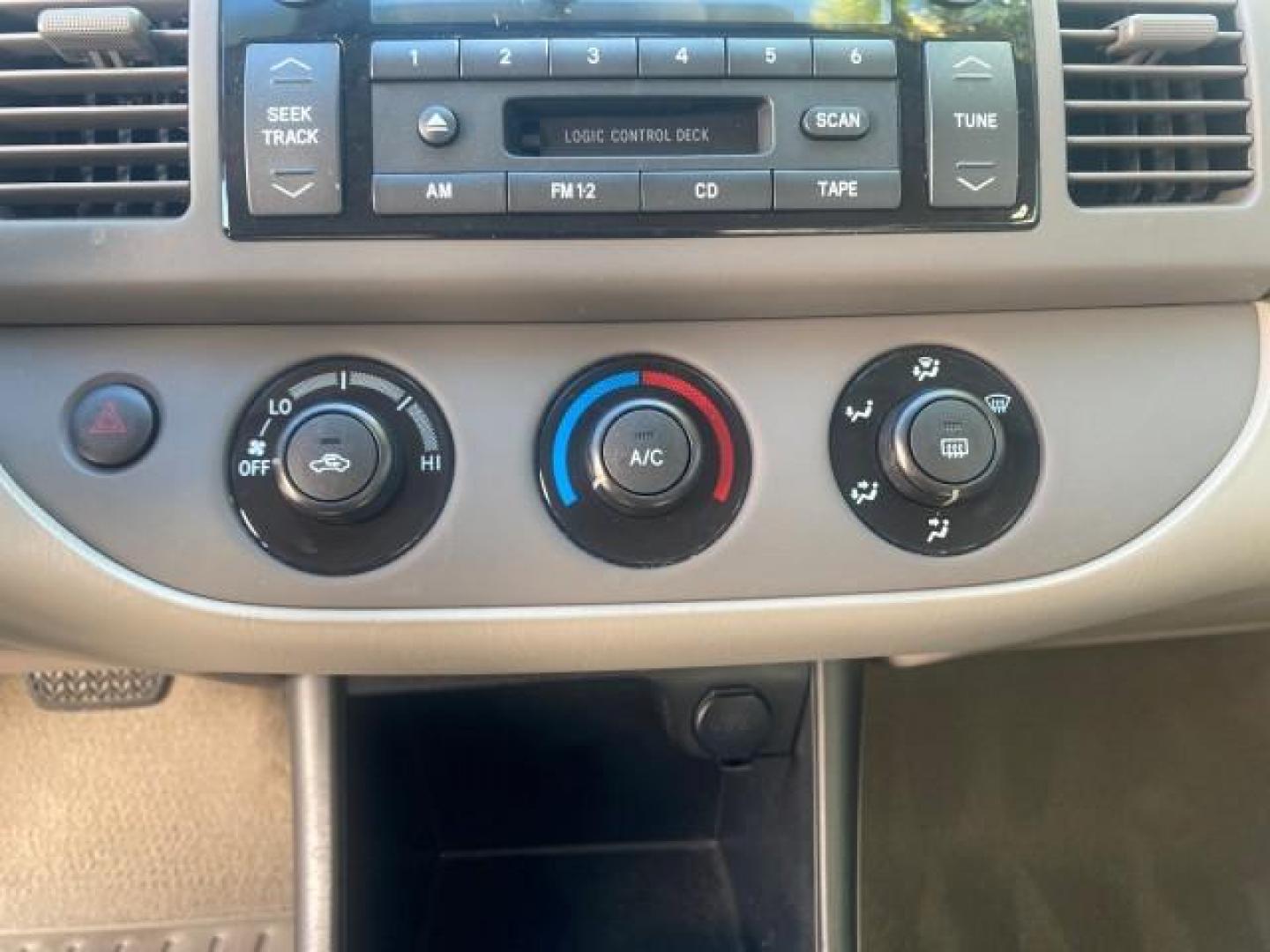 2004 Desert Sand Mica /Taupe Toyota Camry LE LOW MILES 25,414 ACTUAL (4T1BE32K04U) with an 2.4L DOHC MPFI Vvti 16-Valve 4-Cyl Engine engine, Automatic transmission, located at 4701 North Dixie Hwy, Pompano Beach, FL, 33064, (954) 422-2889, 26.240938, -80.123474 - OUR WEBPAGE FLORIDACARS1.COM HAS OVER 100 PHOTOS AND FREE CARFAX LINK 2004 TOYOTA CAMRY LE VIN: 4T1BE32K04U806344 4 T 1 B E 3 2 K 0 4 U 8 0 6 3 4 4 SEDAN 4 DR 2.4L I4 F DOHC 16V GASOLINE 32 MPG FRONT WHEEL DRIVE Features ABS Brakes Air Conditioning AM/FM Stereo Automatic Transmission Cassette Player - Photo#60