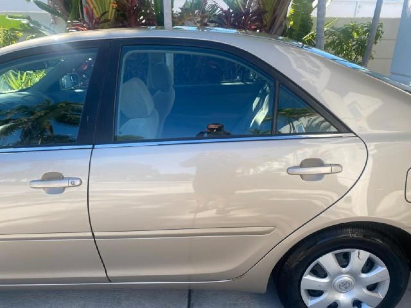 2004 Desert Sand Mica /Taupe Toyota Camry LE LOW MILES 25,414 ACTUAL (4T1BE32K04U) with an 2.4L DOHC MPFI Vvti 16-Valve 4-Cyl Engine engine, Automatic transmission, located at 4701 North Dixie Hwy, Pompano Beach, FL, 33064, (954) 422-2889, 26.240938, -80.123474 - OUR WEBPAGE FLORIDACARS1.COM HAS OVER 100 PHOTOS AND FREE CARFAX LINK 2004 TOYOTA CAMRY LE VIN: 4T1BE32K04U806344 4 T 1 B E 3 2 K 0 4 U 8 0 6 3 4 4 SEDAN 4 DR 2.4L I4 F DOHC 16V GASOLINE 32 MPG FRONT WHEEL DRIVE Features ABS Brakes Air Conditioning AM/FM Stereo Automatic Transmission Cassette Player - Photo#73