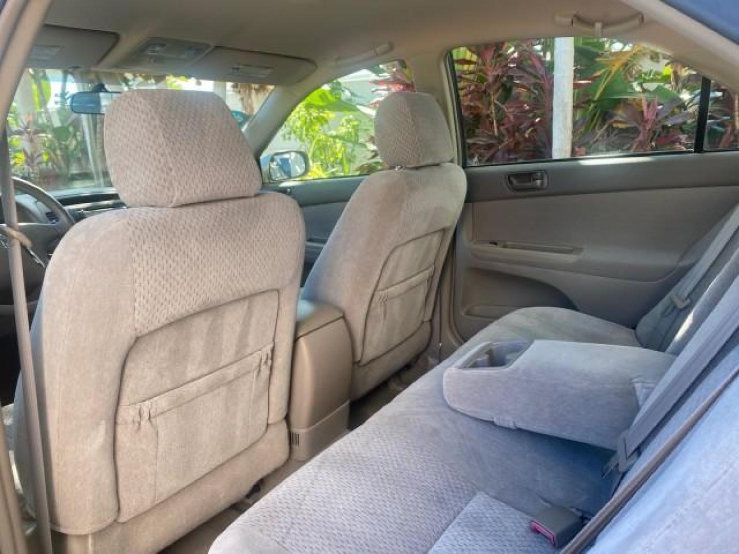 2004 Desert Sand Mica /Taupe Toyota Camry LE LOW MILES 25,414 ACTUAL (4T1BE32K04U) with an 2.4L DOHC MPFI Vvti 16-Valve 4-Cyl Engine engine, Automatic transmission, located at 4701 North Dixie Hwy, Pompano Beach, FL, 33064, (954) 422-2889, 26.240938, -80.123474 - OUR WEBPAGE FLORIDACARS1.COM HAS OVER 100 PHOTOS AND FREE CARFAX LINK 2004 TOYOTA CAMRY LE VIN: 4T1BE32K04U806344 4 T 1 B E 3 2 K 0 4 U 8 0 6 3 4 4 SEDAN 4 DR 2.4L I4 F DOHC 16V GASOLINE 32 MPG FRONT WHEEL DRIVE Features ABS Brakes Air Conditioning AM/FM Stereo Automatic Transmission Cassette Player - Photo#80