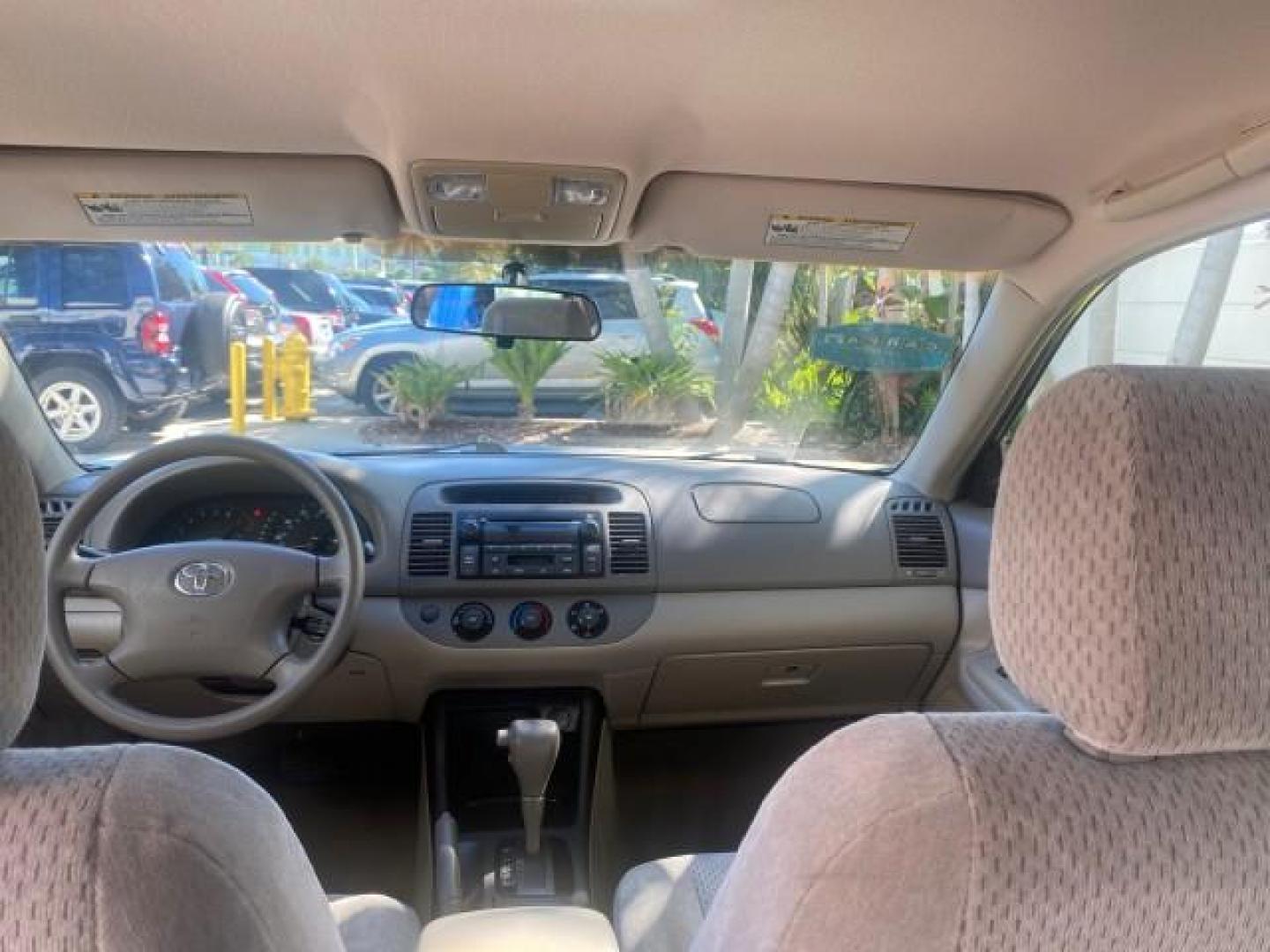 2004 Desert Sand Mica /Taupe Toyota Camry LE LOW MILES 25,414 ACTUAL (4T1BE32K04U) with an 2.4L DOHC MPFI Vvti 16-Valve 4-Cyl Engine engine, Automatic transmission, located at 4701 North Dixie Hwy, Pompano Beach, FL, 33064, (954) 422-2889, 26.240938, -80.123474 - OUR WEBPAGE FLORIDACARS1.COM HAS OVER 100 PHOTOS AND FREE CARFAX LINK 2004 TOYOTA CAMRY LE VIN: 4T1BE32K04U806344 4 T 1 B E 3 2 K 0 4 U 8 0 6 3 4 4 SEDAN 4 DR 2.4L I4 F DOHC 16V GASOLINE 32 MPG FRONT WHEEL DRIVE Features ABS Brakes Air Conditioning AM/FM Stereo Automatic Transmission Cassette Player - Photo#82