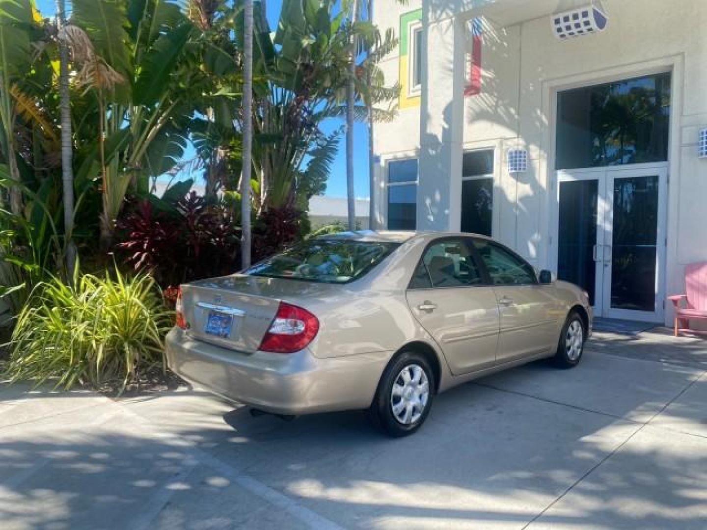 2004 Desert Sand Mica /Taupe Toyota Camry LE LOW MILES 25,414 ACTUAL (4T1BE32K04U) with an 2.4L DOHC MPFI Vvti 16-Valve 4-Cyl Engine engine, Automatic transmission, located at 4701 North Dixie Hwy, Pompano Beach, FL, 33064, (954) 422-2889, 26.240938, -80.123474 - OUR WEBPAGE FLORIDACARS1.COM HAS OVER 100 PHOTOS AND FREE CARFAX LINK 2004 TOYOTA CAMRY LE VIN: 4T1BE32K04U806344 4 T 1 B E 3 2 K 0 4 U 8 0 6 3 4 4 SEDAN 4 DR 2.4L I4 F DOHC 16V GASOLINE 32 MPG FRONT WHEEL DRIVE Features ABS Brakes Air Conditioning AM/FM Stereo Automatic Transmission Cassette Player - Photo#98