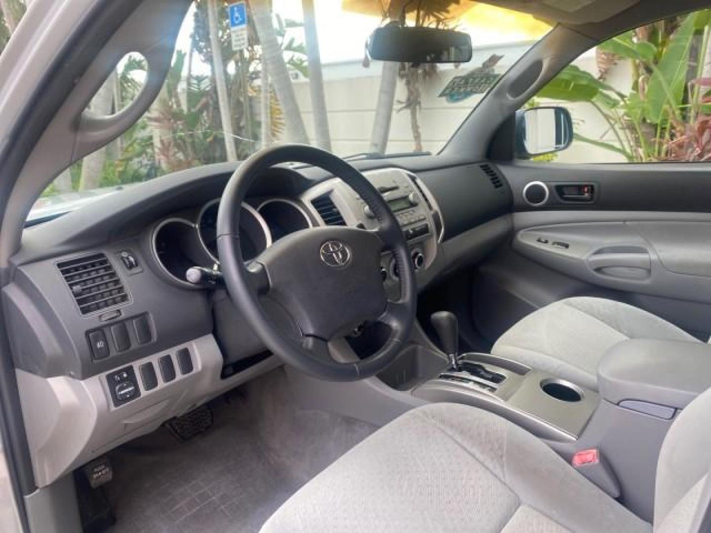 2006 Silver Streak Mica /Graphite Toyota Tacoma 1 OWNER 4WD CREW CAB (3TMMU52N46M) with an 4.0L DOHC EFI 24-Valve V6 VVT-i Engine engine, Automatic transmission, located at 4701 North Dixie Hwy, Pompano Beach, FL, 33064, (954) 422-2889, 26.240938, -80.123474 - OUR WEBPAGE FLORIDACARS1.COM HAS OVER 100 PHOTOS AND FREE CARFAX LINK 2006 TOYOTA TACOMA V6 4 DOOR CREW CAB VIN: 3TMMU52N46M001928 3 T M M U 5 2 N 4 6 M 0 0 1 9 2 8 CREW PICKUP 4.0L V6 F DOHC 24V GASOLINE 21 MPG REAR WHEEL DRIVE W/ 4X4 Features 4WD/AWD ABS Brakes Air Conditioning Alloy Wheels AM/FM - Photo#48