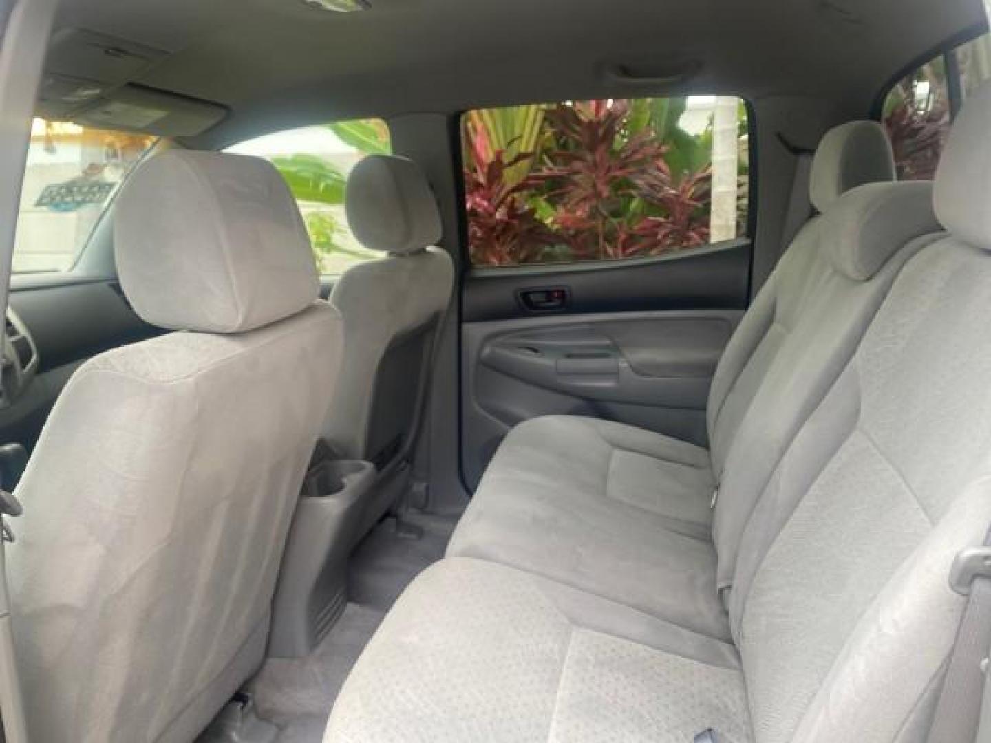 2006 Silver Streak Mica /Graphite Toyota Tacoma 1 OWNER 4WD CREW CAB (3TMMU52N46M) with an 4.0L DOHC EFI 24-Valve V6 VVT-i Engine engine, Automatic transmission, located at 4701 North Dixie Hwy, Pompano Beach, FL, 33064, (954) 422-2889, 26.240938, -80.123474 - OUR WEBPAGE FLORIDACARS1.COM HAS OVER 100 PHOTOS AND FREE CARFAX LINK 2006 TOYOTA TACOMA V6 4 DOOR CREW CAB VIN: 3TMMU52N46M001928 3 T M M U 5 2 N 4 6 M 0 0 1 9 2 8 CREW PICKUP 4.0L V6 F DOHC 24V GASOLINE 21 MPG REAR WHEEL DRIVE W/ 4X4 Features 4WD/AWD ABS Brakes Air Conditioning Alloy Wheels AM/FM - Photo#82