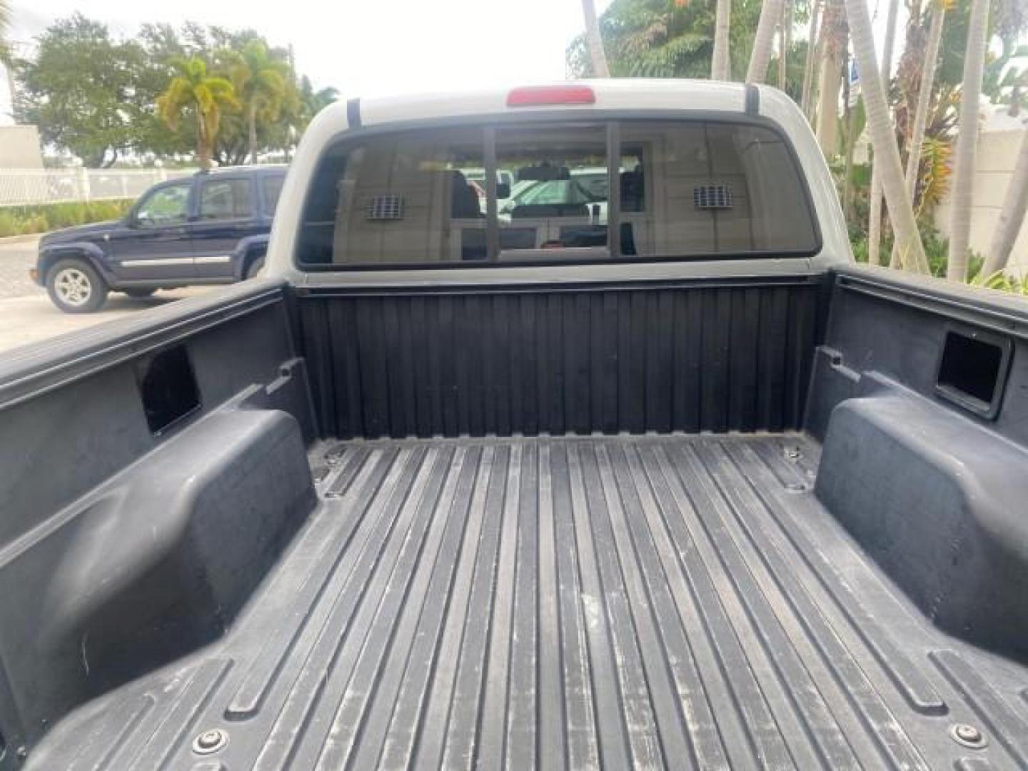 2006 Silver Streak Mica /Graphite Toyota Tacoma 1 OWNER 4WD CREW CAB (3TMMU52N46M) with an 4.0L DOHC EFI 24-Valve V6 VVT-i Engine engine, Automatic transmission, located at 4701 North Dixie Hwy, Pompano Beach, FL, 33064, (954) 422-2889, 26.240938, -80.123474 - OUR WEBPAGE FLORIDACARS1.COM HAS OVER 100 PHOTOS AND FREE CARFAX LINK 2006 TOYOTA TACOMA V6 4 DOOR CREW CAB VIN: 3TMMU52N46M001928 3 T M M U 5 2 N 4 6 M 0 0 1 9 2 8 CREW PICKUP 4.0L V6 F DOHC 24V GASOLINE 21 MPG REAR WHEEL DRIVE W/ 4X4 Features 4WD/AWD ABS Brakes Air Conditioning Alloy Wheels AM/FM - Photo#98