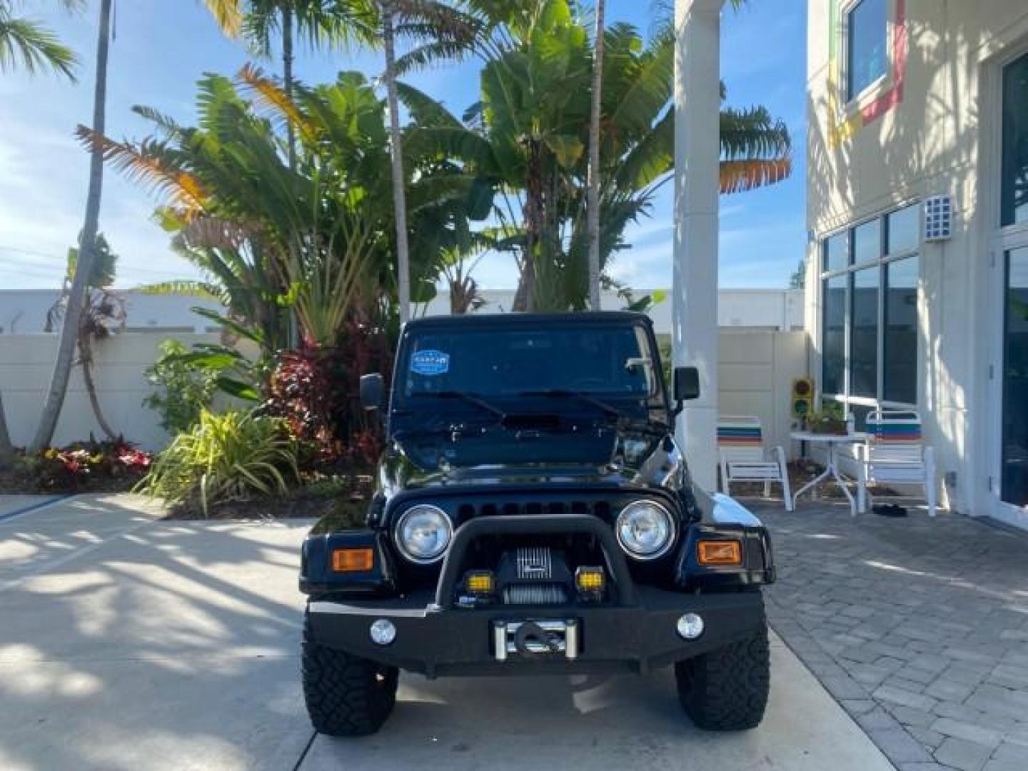 2001 Black /Agate Jeep Wrangler AUTO AC LOW MILES 77,760 HARD TOP (1J4FA49S61P) with an 4.0L SMFI I6 Power Tech Engine engine, Automatic transmission, located at 4701 North Dixie Hwy, Pompano Beach, FL, 33064, (954) 422-2889, 26.240938, -80.123474 - OUR WEBPAGE FLORIDACARS1.COM HAS OVER 100 PHOTOS AND FREE CARFAX LINK 2001 JEEP WRANGLER SPORT REMOVABLE HARD TOP VIN: 1J4FA49S61P364008 1 J 4 F A 4 9 S 6 1 P 3 6 4 0 0 8 UTILITY (BLAZER, JIMMY, SCOUT, ETC.) 4.0L I6 F GASOLINE REAR WHEEL DRIVE W/ 4X4 Features 4WD/AWD Air Conditioning Alloy Wheels AM - Photo#2