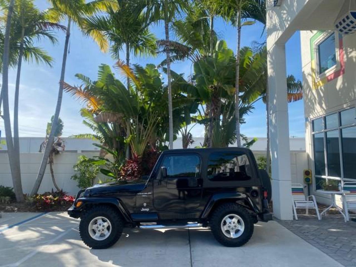 2001 Black /Agate Jeep Wrangler AUTO AC LOW MILES 77,760 HARD TOP (1J4FA49S61P) with an 4.0L SMFI I6 Power Tech Engine engine, Automatic transmission, located at 4701 North Dixie Hwy, Pompano Beach, FL, 33064, (954) 422-2889, 26.240938, -80.123474 - OUR WEBPAGE FLORIDACARS1.COM HAS OVER 100 PHOTOS AND FREE CARFAX LINK 2001 JEEP WRANGLER SPORT REMOVABLE HARD TOP VIN: 1J4FA49S61P364008 1 J 4 F A 4 9 S 6 1 P 3 6 4 0 0 8 UTILITY (BLAZER, JIMMY, SCOUT, ETC.) 4.0L I6 F GASOLINE REAR WHEEL DRIVE W/ 4X4 Features 4WD/AWD Air Conditioning Alloy Wheels AM - Photo#4