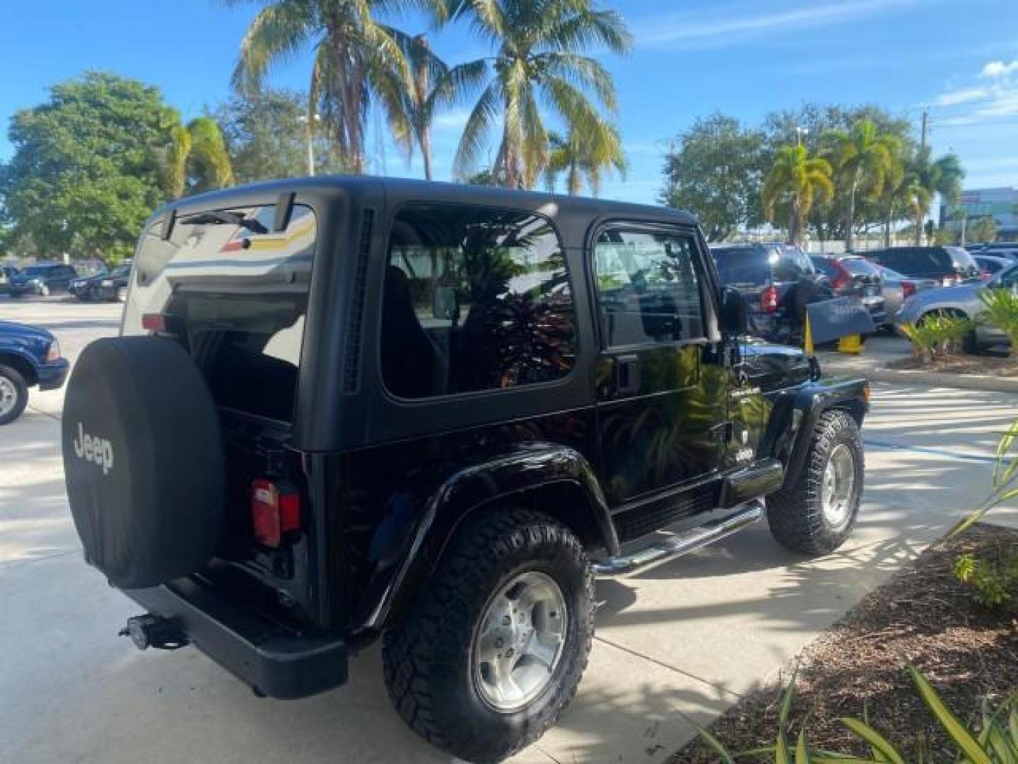 2001 Black /Agate Jeep Wrangler AUTO AC LOW MILES 77,760 HARD TOP (1J4FA49S61P) with an 4.0L SMFI I6 Power Tech Engine engine, Automatic transmission, located at 4701 North Dixie Hwy, Pompano Beach, FL, 33064, (954) 422-2889, 26.240938, -80.123474 - OUR WEBPAGE FLORIDACARS1.COM HAS OVER 100 PHOTOS AND FREE CARFAX LINK 2001 JEEP WRANGLER SPORT REMOVABLE HARD TOP VIN: 1J4FA49S61P364008 1 J 4 F A 4 9 S 6 1 P 3 6 4 0 0 8 UTILITY (BLAZER, JIMMY, SCOUT, ETC.) 4.0L I6 F GASOLINE REAR WHEEL DRIVE W/ 4X4 Features 4WD/AWD Air Conditioning Alloy Wheels AM - Photo#7