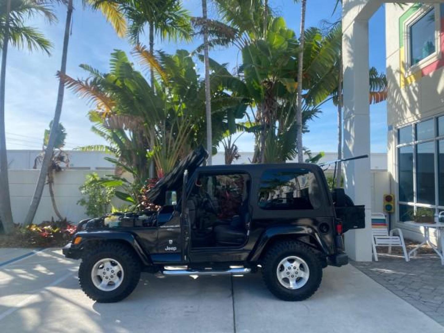 2001 Black /Agate Jeep Wrangler AUTO AC LOW MILES 77,760 HARD TOP (1J4FA49S61P) with an 4.0L SMFI I6 Power Tech Engine engine, Automatic transmission, located at 4701 North Dixie Hwy, Pompano Beach, FL, 33064, (954) 422-2889, 26.240938, -80.123474 - OUR WEBPAGE FLORIDACARS1.COM HAS OVER 100 PHOTOS AND FREE CARFAX LINK 2001 JEEP WRANGLER SPORT REMOVABLE HARD TOP VIN: 1J4FA49S61P364008 1 J 4 F A 4 9 S 6 1 P 3 6 4 0 0 8 UTILITY (BLAZER, JIMMY, SCOUT, ETC.) 4.0L I6 F GASOLINE REAR WHEEL DRIVE W/ 4X4 Features 4WD/AWD Air Conditioning Alloy Wheels AM - Photo#8