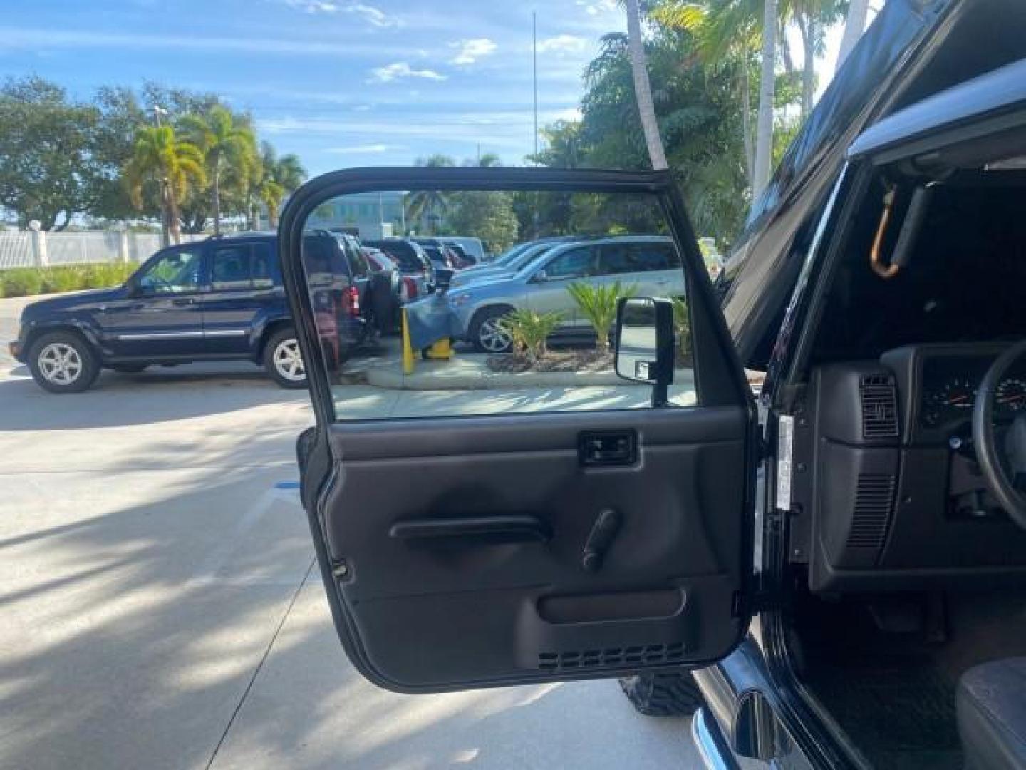 2001 Black /Agate Jeep Wrangler AUTO AC LOW MILES 77,760 HARD TOP (1J4FA49S61P) with an 4.0L SMFI I6 Power Tech Engine engine, Automatic transmission, located at 4701 North Dixie Hwy, Pompano Beach, FL, 33064, (954) 422-2889, 26.240938, -80.123474 - OUR WEBPAGE FLORIDACARS1.COM HAS OVER 100 PHOTOS AND FREE CARFAX LINK 2001 JEEP WRANGLER SPORT REMOVABLE HARD TOP VIN: 1J4FA49S61P364008 1 J 4 F A 4 9 S 6 1 P 3 6 4 0 0 8 UTILITY (BLAZER, JIMMY, SCOUT, ETC.) 4.0L I6 F GASOLINE REAR WHEEL DRIVE W/ 4X4 Features 4WD/AWD Air Conditioning Alloy Wheels AM - Photo#9