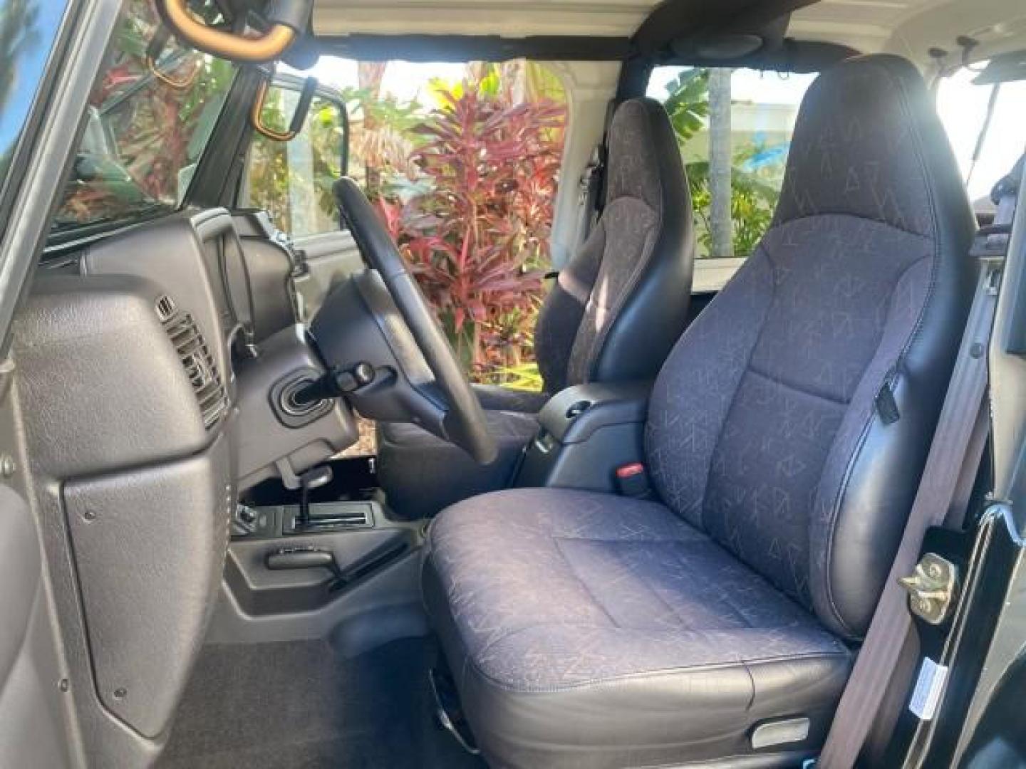 2001 Black /Agate Jeep Wrangler AUTO AC LOW MILES 77,760 HARD TOP (1J4FA49S61P) with an 4.0L SMFI I6 Power Tech Engine engine, Automatic transmission, located at 4701 North Dixie Hwy, Pompano Beach, FL, 33064, (954) 422-2889, 26.240938, -80.123474 - OUR WEBPAGE FLORIDACARS1.COM HAS OVER 100 PHOTOS AND FREE CARFAX LINK 2001 JEEP WRANGLER SPORT REMOVABLE HARD TOP VIN: 1J4FA49S61P364008 1 J 4 F A 4 9 S 6 1 P 3 6 4 0 0 8 UTILITY (BLAZER, JIMMY, SCOUT, ETC.) 4.0L I6 F GASOLINE REAR WHEEL DRIVE W/ 4X4 Features 4WD/AWD Air Conditioning Alloy Wheels AM - Photo#10