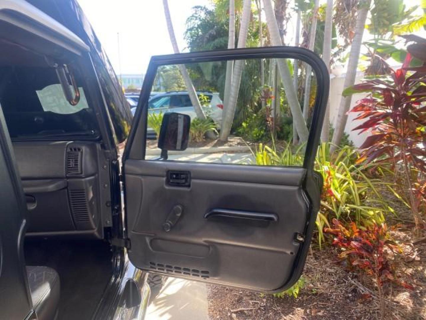 2001 Black /Agate Jeep Wrangler AUTO AC LOW MILES 77,760 HARD TOP (1J4FA49S61P) with an 4.0L SMFI I6 Power Tech Engine engine, Automatic transmission, located at 4701 North Dixie Hwy, Pompano Beach, FL, 33064, (954) 422-2889, 26.240938, -80.123474 - OUR WEBPAGE FLORIDACARS1.COM HAS OVER 100 PHOTOS AND FREE CARFAX LINK 2001 JEEP WRANGLER SPORT REMOVABLE HARD TOP VIN: 1J4FA49S61P364008 1 J 4 F A 4 9 S 6 1 P 3 6 4 0 0 8 UTILITY (BLAZER, JIMMY, SCOUT, ETC.) 4.0L I6 F GASOLINE REAR WHEEL DRIVE W/ 4X4 Features 4WD/AWD Air Conditioning Alloy Wheels AM - Photo#11