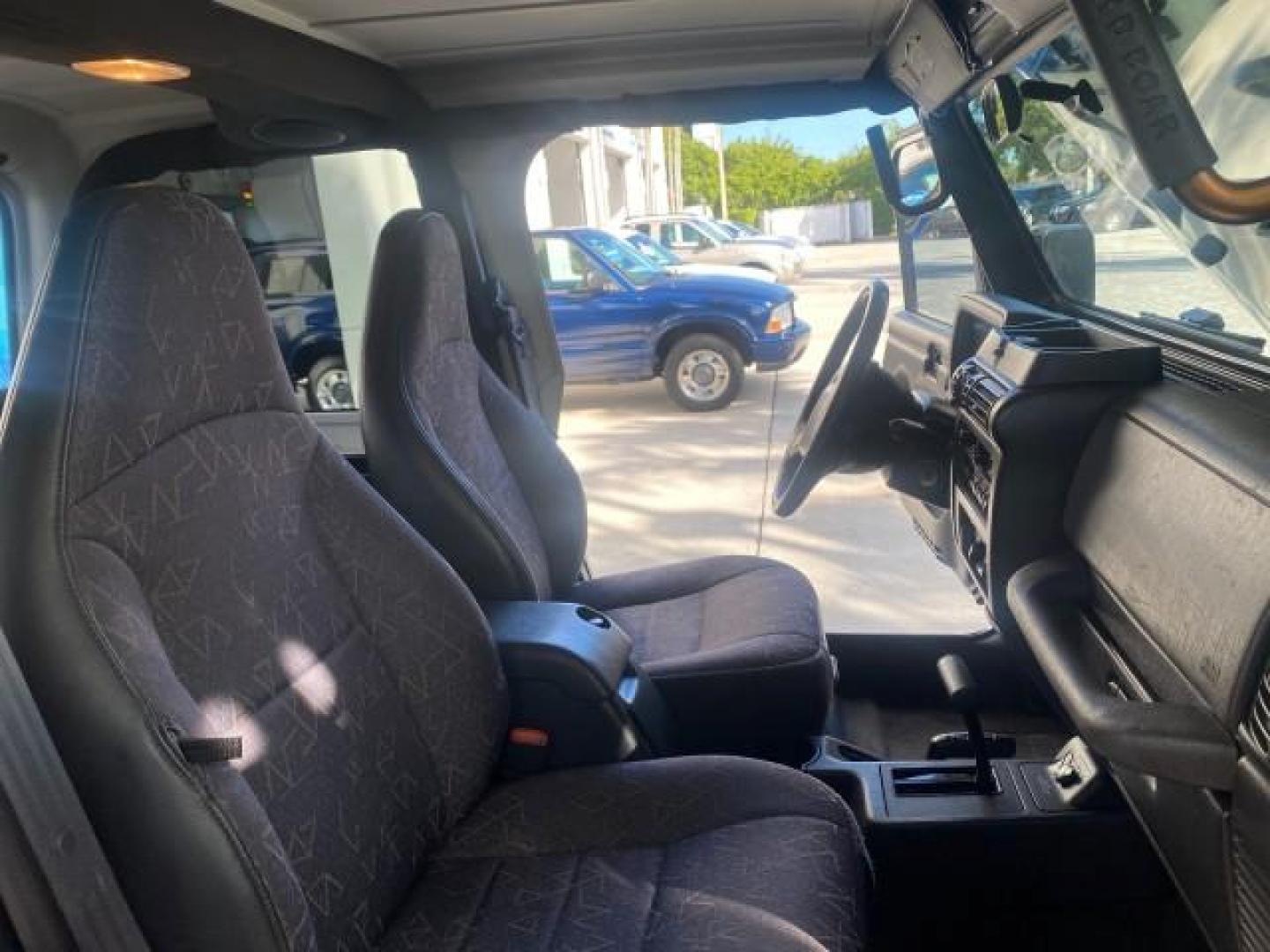 2001 Black /Agate Jeep Wrangler AUTO AC LOW MILES 77,760 HARD TOP (1J4FA49S61P) with an 4.0L SMFI I6 Power Tech Engine engine, Automatic transmission, located at 4701 North Dixie Hwy, Pompano Beach, FL, 33064, (954) 422-2889, 26.240938, -80.123474 - OUR WEBPAGE FLORIDACARS1.COM HAS OVER 100 PHOTOS AND FREE CARFAX LINK 2001 JEEP WRANGLER SPORT REMOVABLE HARD TOP VIN: 1J4FA49S61P364008 1 J 4 F A 4 9 S 6 1 P 3 6 4 0 0 8 UTILITY (BLAZER, JIMMY, SCOUT, ETC.) 4.0L I6 F GASOLINE REAR WHEEL DRIVE W/ 4X4 Features 4WD/AWD Air Conditioning Alloy Wheels AM - Photo#12