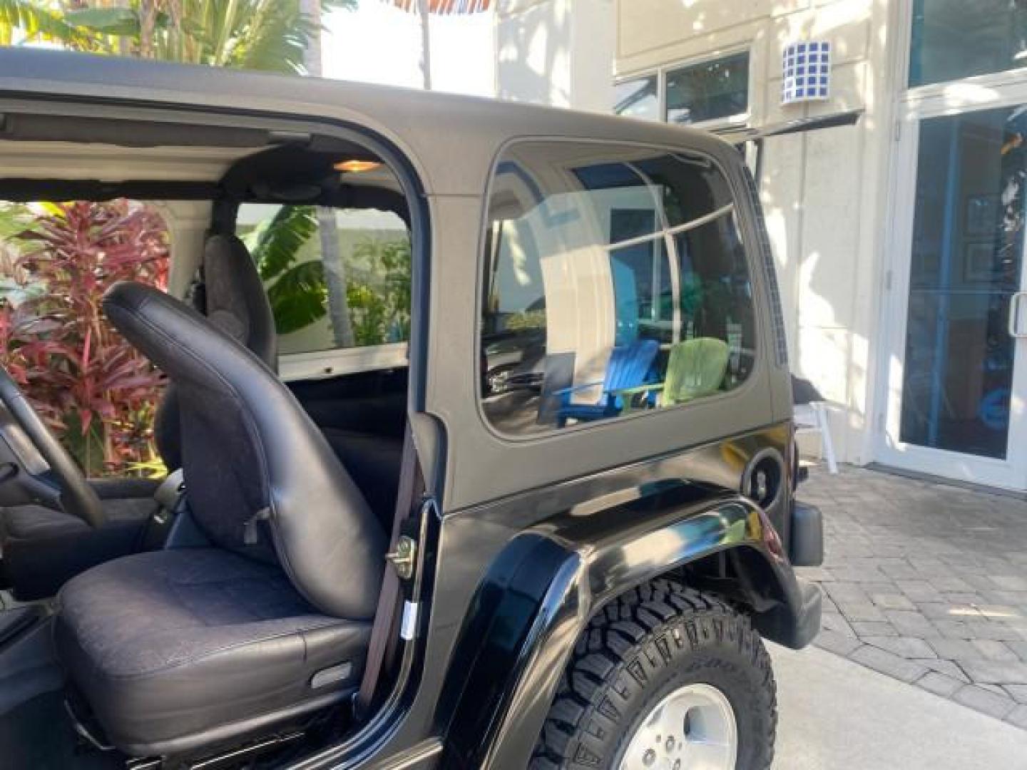 2001 Black /Agate Jeep Wrangler AUTO AC LOW MILES 77,760 HARD TOP (1J4FA49S61P) with an 4.0L SMFI I6 Power Tech Engine engine, Automatic transmission, located at 4701 North Dixie Hwy, Pompano Beach, FL, 33064, (954) 422-2889, 26.240938, -80.123474 - OUR WEBPAGE FLORIDACARS1.COM HAS OVER 100 PHOTOS AND FREE CARFAX LINK 2001 JEEP WRANGLER SPORT REMOVABLE HARD TOP VIN: 1J4FA49S61P364008 1 J 4 F A 4 9 S 6 1 P 3 6 4 0 0 8 UTILITY (BLAZER, JIMMY, SCOUT, ETC.) 4.0L I6 F GASOLINE REAR WHEEL DRIVE W/ 4X4 Features 4WD/AWD Air Conditioning Alloy Wheels AM - Photo#13