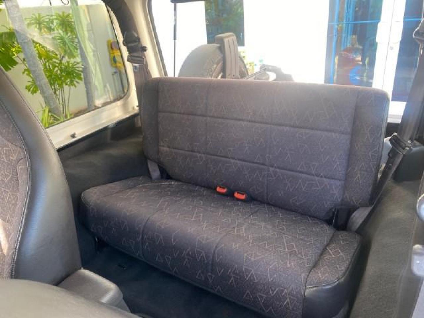 2001 Black /Agate Jeep Wrangler AUTO AC LOW MILES 77,760 HARD TOP (1J4FA49S61P) with an 4.0L SMFI I6 Power Tech Engine engine, Automatic transmission, located at 4701 North Dixie Hwy, Pompano Beach, FL, 33064, (954) 422-2889, 26.240938, -80.123474 - OUR WEBPAGE FLORIDACARS1.COM HAS OVER 100 PHOTOS AND FREE CARFAX LINK 2001 JEEP WRANGLER SPORT REMOVABLE HARD TOP VIN: 1J4FA49S61P364008 1 J 4 F A 4 9 S 6 1 P 3 6 4 0 0 8 UTILITY (BLAZER, JIMMY, SCOUT, ETC.) 4.0L I6 F GASOLINE REAR WHEEL DRIVE W/ 4X4 Features 4WD/AWD Air Conditioning Alloy Wheels AM - Photo#14