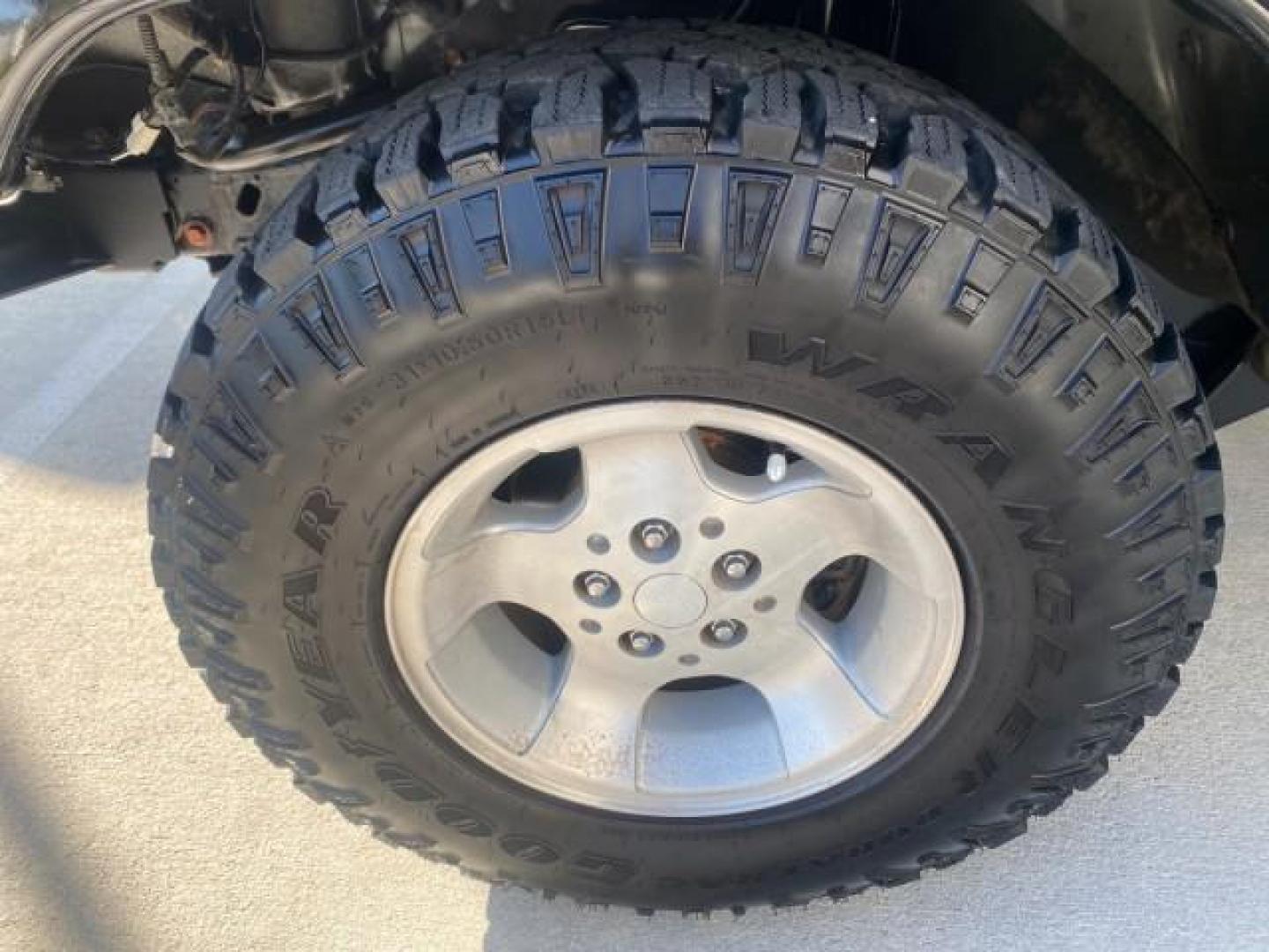 2001 Black /Agate Jeep Wrangler AUTO AC LOW MILES 77,760 HARD TOP (1J4FA49S61P) with an 4.0L SMFI I6 Power Tech Engine engine, Automatic transmission, located at 4701 North Dixie Hwy, Pompano Beach, FL, 33064, (954) 422-2889, 26.240938, -80.123474 - OUR WEBPAGE FLORIDACARS1.COM HAS OVER 100 PHOTOS AND FREE CARFAX LINK 2001 JEEP WRANGLER SPORT REMOVABLE HARD TOP VIN: 1J4FA49S61P364008 1 J 4 F A 4 9 S 6 1 P 3 6 4 0 0 8 UTILITY (BLAZER, JIMMY, SCOUT, ETC.) 4.0L I6 F GASOLINE REAR WHEEL DRIVE W/ 4X4 Features 4WD/AWD Air Conditioning Alloy Wheels AM - Photo#19