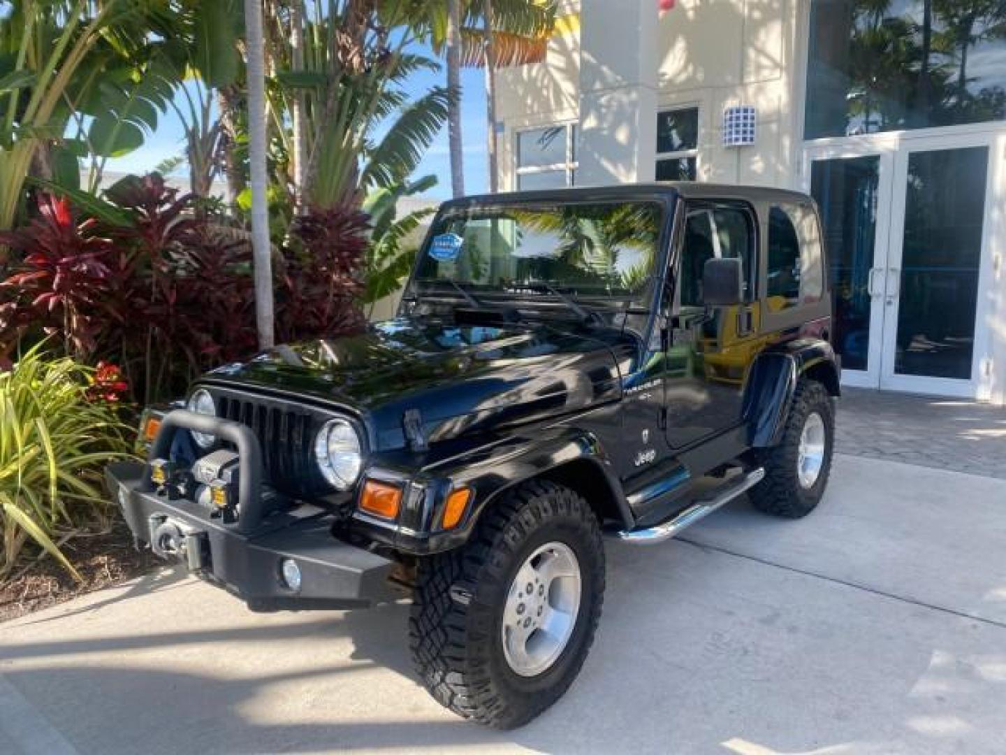 2001 Black /Agate Jeep Wrangler AUTO AC LOW MILES 77,760 HARD TOP (1J4FA49S61P) with an 4.0L SMFI I6 Power Tech Engine engine, Automatic transmission, located at 4701 North Dixie Hwy, Pompano Beach, FL, 33064, (954) 422-2889, 26.240938, -80.123474 - OUR WEBPAGE FLORIDACARS1.COM HAS OVER 100 PHOTOS AND FREE CARFAX LINK 2001 JEEP WRANGLER SPORT REMOVABLE HARD TOP VIN: 1J4FA49S61P364008 1 J 4 F A 4 9 S 6 1 P 3 6 4 0 0 8 UTILITY (BLAZER, JIMMY, SCOUT, ETC.) 4.0L I6 F GASOLINE REAR WHEEL DRIVE W/ 4X4 Features 4WD/AWD Air Conditioning Alloy Wheels AM - Photo#31