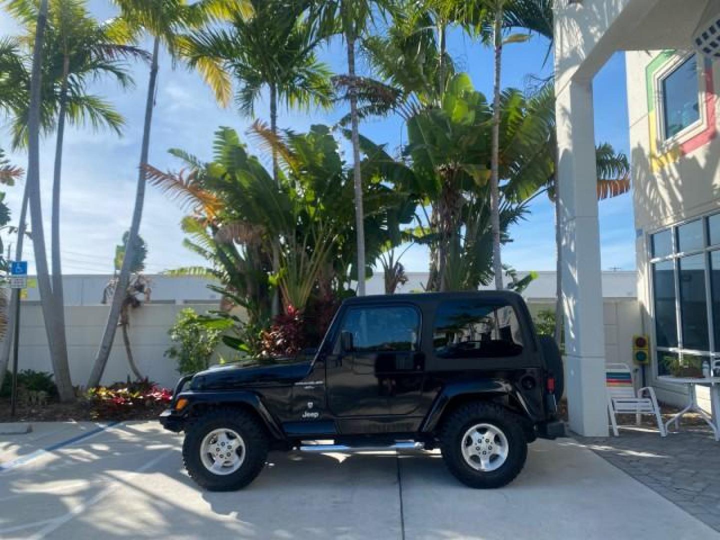 2001 Black /Agate Jeep Wrangler AUTO AC LOW MILES 77,760 HARD TOP (1J4FA49S61P) with an 4.0L SMFI I6 Power Tech Engine engine, Automatic transmission, located at 4701 North Dixie Hwy, Pompano Beach, FL, 33064, (954) 422-2889, 26.240938, -80.123474 - OUR WEBPAGE FLORIDACARS1.COM HAS OVER 100 PHOTOS AND FREE CARFAX LINK 2001 JEEP WRANGLER SPORT REMOVABLE HARD TOP VIN: 1J4FA49S61P364008 1 J 4 F A 4 9 S 6 1 P 3 6 4 0 0 8 UTILITY (BLAZER, JIMMY, SCOUT, ETC.) 4.0L I6 F GASOLINE REAR WHEEL DRIVE W/ 4X4 Features 4WD/AWD Air Conditioning Alloy Wheels AM - Photo#32