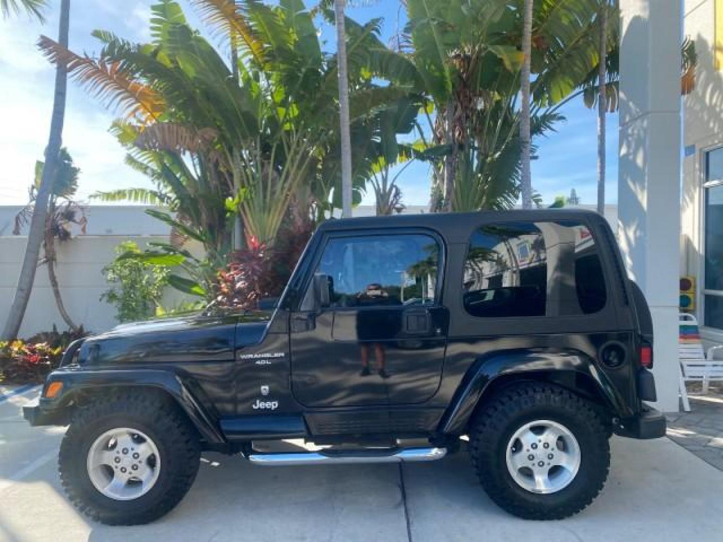 2001 Black /Agate Jeep Wrangler AUTO AC LOW MILES 77,760 HARD TOP (1J4FA49S61P) with an 4.0L SMFI I6 Power Tech Engine engine, Automatic transmission, located at 4701 North Dixie Hwy, Pompano Beach, FL, 33064, (954) 422-2889, 26.240938, -80.123474 - OUR WEBPAGE FLORIDACARS1.COM HAS OVER 100 PHOTOS AND FREE CARFAX LINK 2001 JEEP WRANGLER SPORT REMOVABLE HARD TOP VIN: 1J4FA49S61P364008 1 J 4 F A 4 9 S 6 1 P 3 6 4 0 0 8 UTILITY (BLAZER, JIMMY, SCOUT, ETC.) 4.0L I6 F GASOLINE REAR WHEEL DRIVE W/ 4X4 Features 4WD/AWD Air Conditioning Alloy Wheels AM - Photo#33