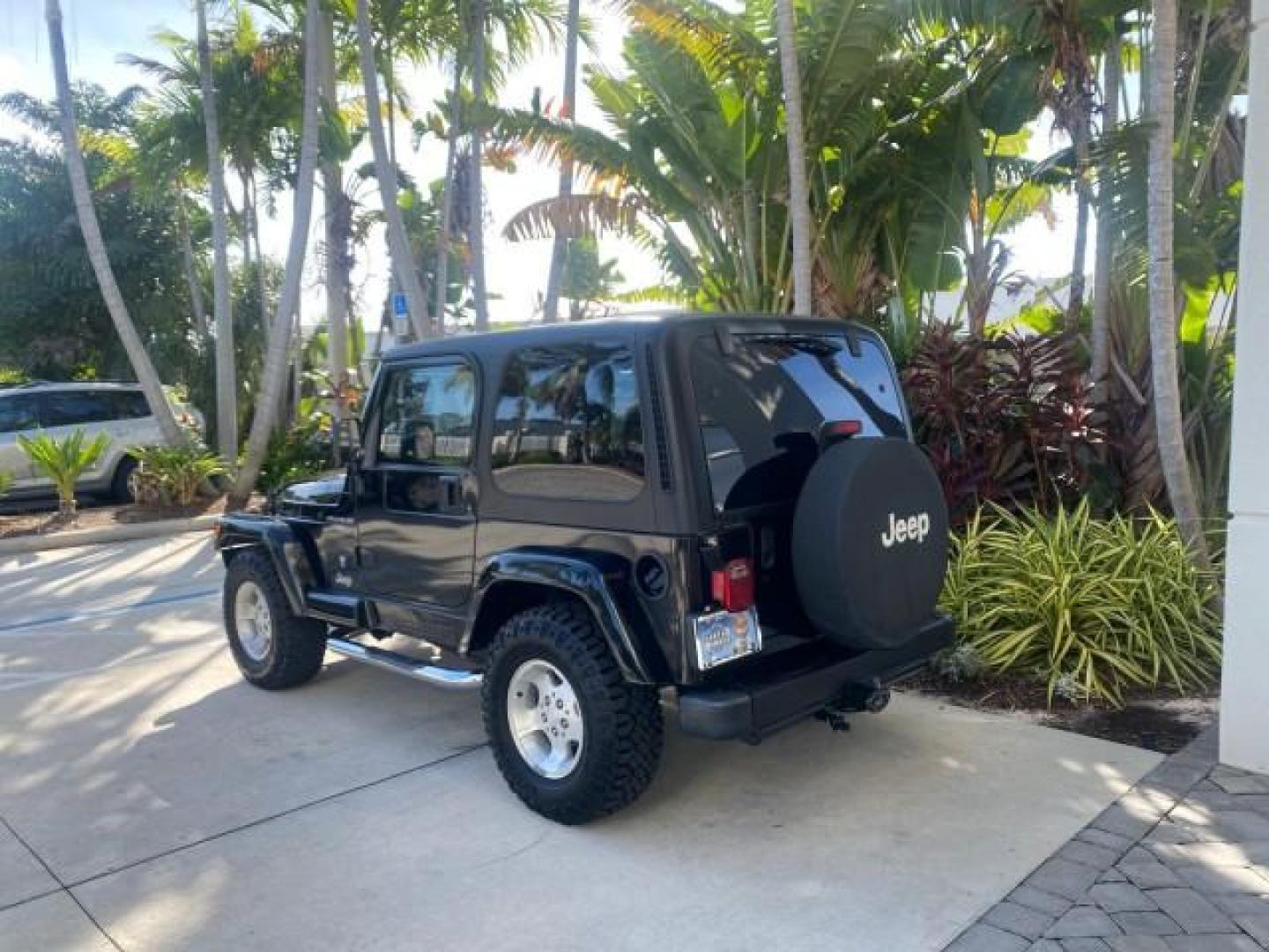 2001 Black /Agate Jeep Wrangler AUTO AC LOW MILES 77,760 HARD TOP (1J4FA49S61P) with an 4.0L SMFI I6 Power Tech Engine engine, Automatic transmission, located at 4701 North Dixie Hwy, Pompano Beach, FL, 33064, (954) 422-2889, 26.240938, -80.123474 - OUR WEBPAGE FLORIDACARS1.COM HAS OVER 100 PHOTOS AND FREE CARFAX LINK 2001 JEEP WRANGLER SPORT REMOVABLE HARD TOP VIN: 1J4FA49S61P364008 1 J 4 F A 4 9 S 6 1 P 3 6 4 0 0 8 UTILITY (BLAZER, JIMMY, SCOUT, ETC.) 4.0L I6 F GASOLINE REAR WHEEL DRIVE W/ 4X4 Features 4WD/AWD Air Conditioning Alloy Wheels AM - Photo#34