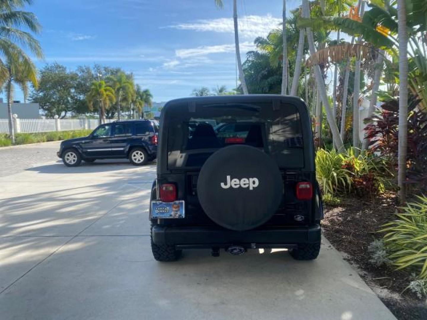 2001 Black /Agate Jeep Wrangler AUTO AC LOW MILES 77,760 HARD TOP (1J4FA49S61P) with an 4.0L SMFI I6 Power Tech Engine engine, Automatic transmission, located at 4701 North Dixie Hwy, Pompano Beach, FL, 33064, (954) 422-2889, 26.240938, -80.123474 - OUR WEBPAGE FLORIDACARS1.COM HAS OVER 100 PHOTOS AND FREE CARFAX LINK 2001 JEEP WRANGLER SPORT REMOVABLE HARD TOP VIN: 1J4FA49S61P364008 1 J 4 F A 4 9 S 6 1 P 3 6 4 0 0 8 UTILITY (BLAZER, JIMMY, SCOUT, ETC.) 4.0L I6 F GASOLINE REAR WHEEL DRIVE W/ 4X4 Features 4WD/AWD Air Conditioning Alloy Wheels AM - Photo#36
