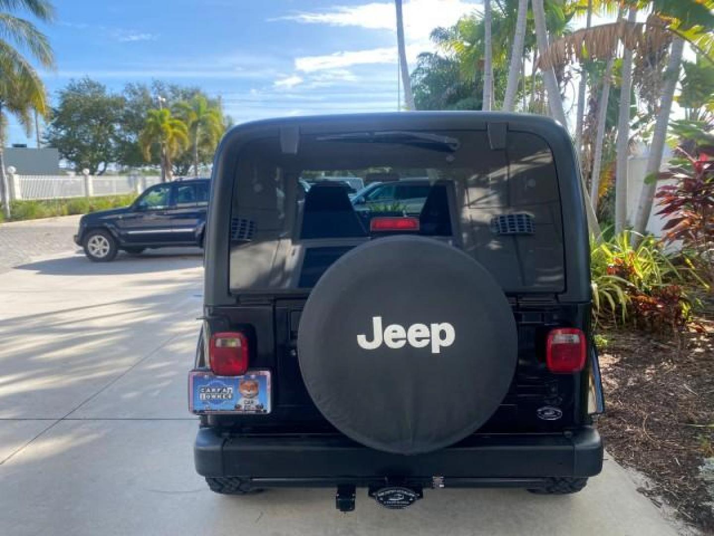 2001 Black /Agate Jeep Wrangler AUTO AC LOW MILES 77,760 HARD TOP (1J4FA49S61P) with an 4.0L SMFI I6 Power Tech Engine engine, Automatic transmission, located at 4701 North Dixie Hwy, Pompano Beach, FL, 33064, (954) 422-2889, 26.240938, -80.123474 - OUR WEBPAGE FLORIDACARS1.COM HAS OVER 100 PHOTOS AND FREE CARFAX LINK 2001 JEEP WRANGLER SPORT REMOVABLE HARD TOP VIN: 1J4FA49S61P364008 1 J 4 F A 4 9 S 6 1 P 3 6 4 0 0 8 UTILITY (BLAZER, JIMMY, SCOUT, ETC.) 4.0L I6 F GASOLINE REAR WHEEL DRIVE W/ 4X4 Features 4WD/AWD Air Conditioning Alloy Wheels AM - Photo#37