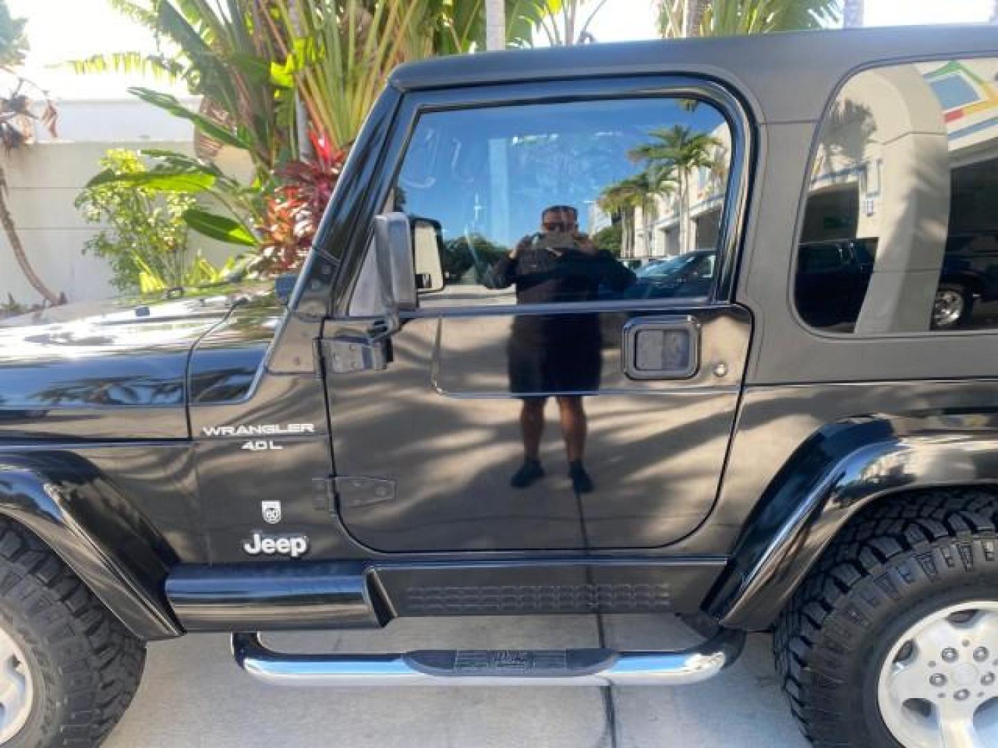 2001 Black /Agate Jeep Wrangler AUTO AC LOW MILES 77,760 HARD TOP (1J4FA49S61P) with an 4.0L SMFI I6 Power Tech Engine engine, Automatic transmission, located at 4701 North Dixie Hwy, Pompano Beach, FL, 33064, (954) 422-2889, 26.240938, -80.123474 - OUR WEBPAGE FLORIDACARS1.COM HAS OVER 100 PHOTOS AND FREE CARFAX LINK 2001 JEEP WRANGLER SPORT REMOVABLE HARD TOP VIN: 1J4FA49S61P364008 1 J 4 F A 4 9 S 6 1 P 3 6 4 0 0 8 UTILITY (BLAZER, JIMMY, SCOUT, ETC.) 4.0L I6 F GASOLINE REAR WHEEL DRIVE W/ 4X4 Features 4WD/AWD Air Conditioning Alloy Wheels AM - Photo#38