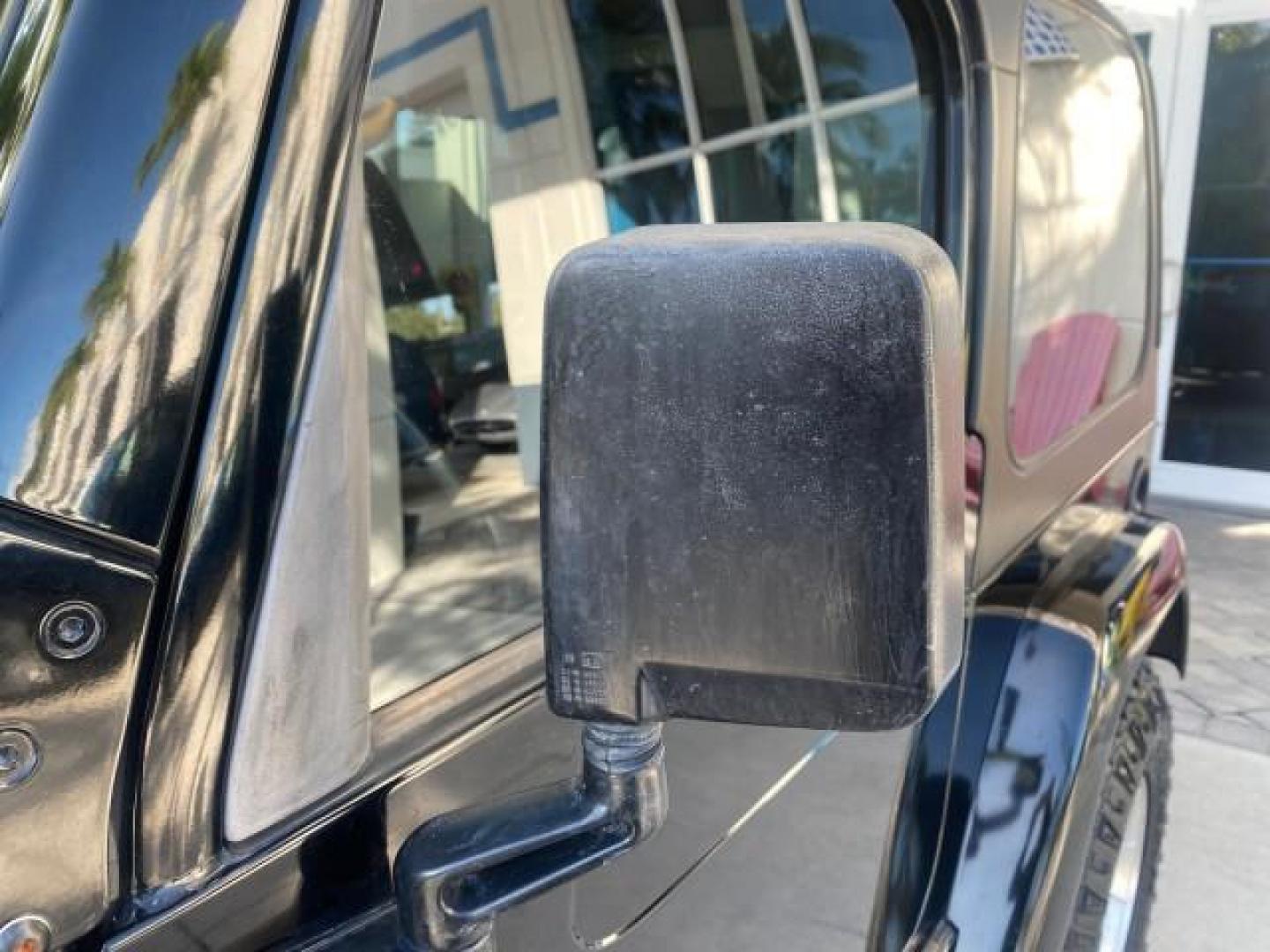 2001 Black /Agate Jeep Wrangler AUTO AC LOW MILES 77,760 HARD TOP (1J4FA49S61P) with an 4.0L SMFI I6 Power Tech Engine engine, Automatic transmission, located at 4701 North Dixie Hwy, Pompano Beach, FL, 33064, (954) 422-2889, 26.240938, -80.123474 - OUR WEBPAGE FLORIDACARS1.COM HAS OVER 100 PHOTOS AND FREE CARFAX LINK 2001 JEEP WRANGLER SPORT REMOVABLE HARD TOP VIN: 1J4FA49S61P364008 1 J 4 F A 4 9 S 6 1 P 3 6 4 0 0 8 UTILITY (BLAZER, JIMMY, SCOUT, ETC.) 4.0L I6 F GASOLINE REAR WHEEL DRIVE W/ 4X4 Features 4WD/AWD Air Conditioning Alloy Wheels AM - Photo#41