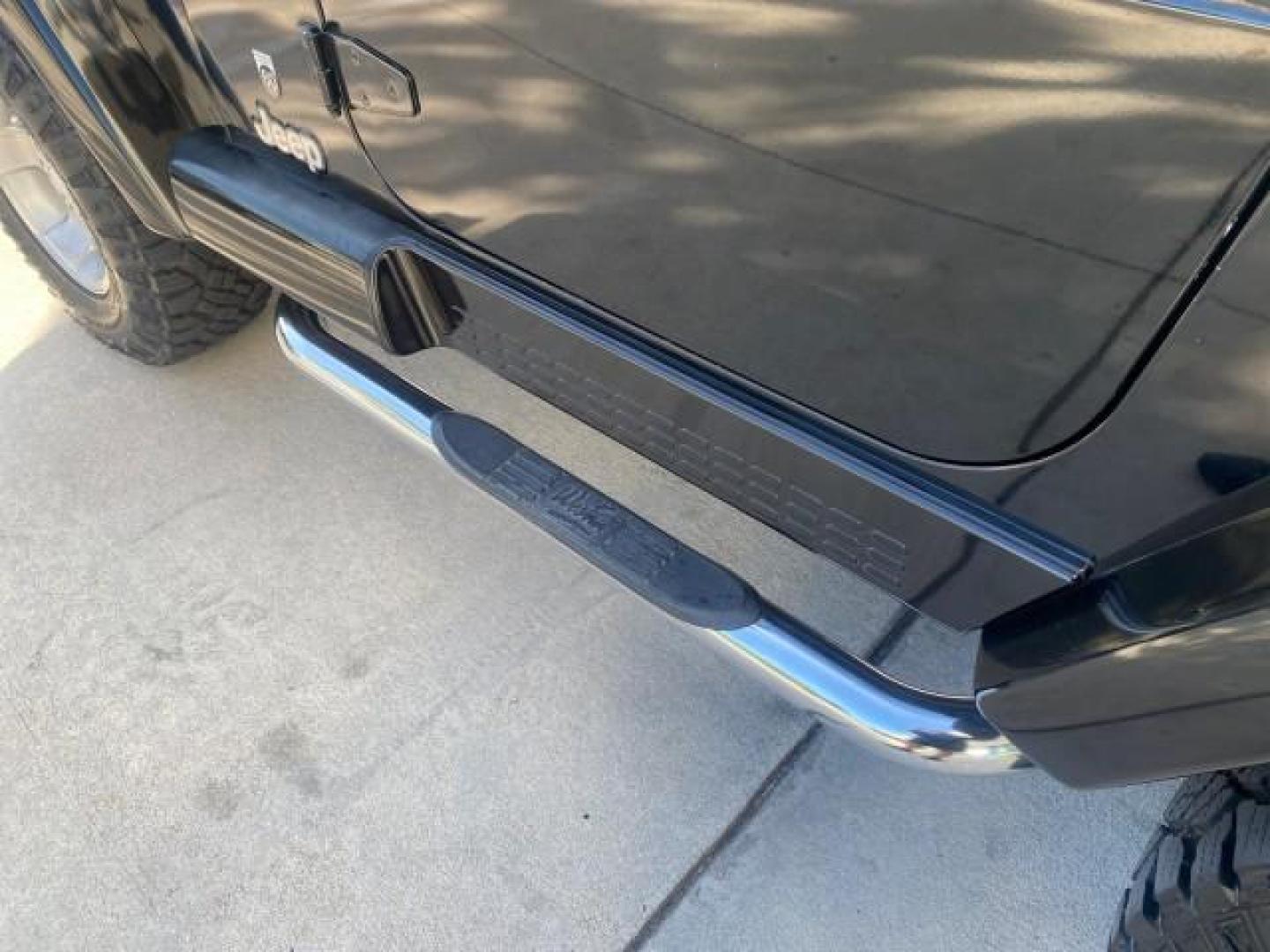 2001 Black /Agate Jeep Wrangler AUTO AC LOW MILES 77,760 HARD TOP (1J4FA49S61P) with an 4.0L SMFI I6 Power Tech Engine engine, Automatic transmission, located at 4701 North Dixie Hwy, Pompano Beach, FL, 33064, (954) 422-2889, 26.240938, -80.123474 - OUR WEBPAGE FLORIDACARS1.COM HAS OVER 100 PHOTOS AND FREE CARFAX LINK 2001 JEEP WRANGLER SPORT REMOVABLE HARD TOP VIN: 1J4FA49S61P364008 1 J 4 F A 4 9 S 6 1 P 3 6 4 0 0 8 UTILITY (BLAZER, JIMMY, SCOUT, ETC.) 4.0L I6 F GASOLINE REAR WHEEL DRIVE W/ 4X4 Features 4WD/AWD Air Conditioning Alloy Wheels AM - Photo#44