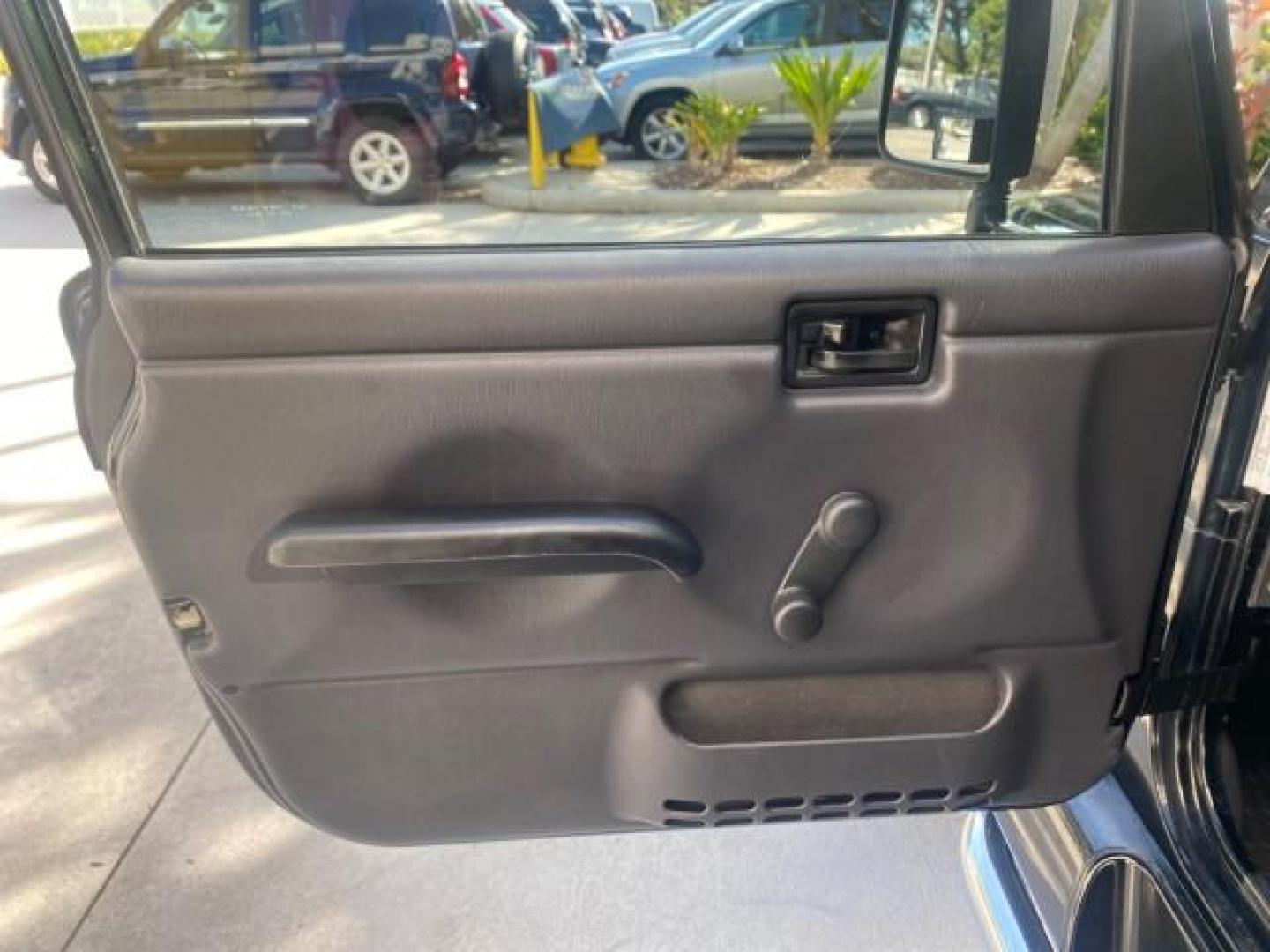 2001 Black /Agate Jeep Wrangler AUTO AC LOW MILES 77,760 HARD TOP (1J4FA49S61P) with an 4.0L SMFI I6 Power Tech Engine engine, Automatic transmission, located at 4701 North Dixie Hwy, Pompano Beach, FL, 33064, (954) 422-2889, 26.240938, -80.123474 - OUR WEBPAGE FLORIDACARS1.COM HAS OVER 100 PHOTOS AND FREE CARFAX LINK 2001 JEEP WRANGLER SPORT REMOVABLE HARD TOP VIN: 1J4FA49S61P364008 1 J 4 F A 4 9 S 6 1 P 3 6 4 0 0 8 UTILITY (BLAZER, JIMMY, SCOUT, ETC.) 4.0L I6 F GASOLINE REAR WHEEL DRIVE W/ 4X4 Features 4WD/AWD Air Conditioning Alloy Wheels AM - Photo#45