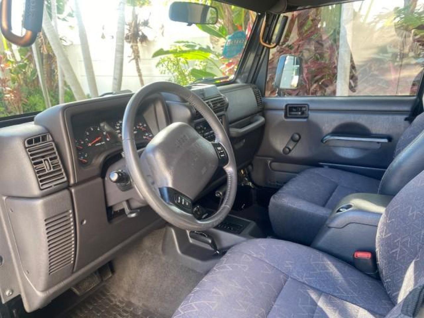 2001 Black /Agate Jeep Wrangler AUTO AC LOW MILES 77,760 HARD TOP (1J4FA49S61P) with an 4.0L SMFI I6 Power Tech Engine engine, Automatic transmission, located at 4701 North Dixie Hwy, Pompano Beach, FL, 33064, (954) 422-2889, 26.240938, -80.123474 - OUR WEBPAGE FLORIDACARS1.COM HAS OVER 100 PHOTOS AND FREE CARFAX LINK 2001 JEEP WRANGLER SPORT REMOVABLE HARD TOP VIN: 1J4FA49S61P364008 1 J 4 F A 4 9 S 6 1 P 3 6 4 0 0 8 UTILITY (BLAZER, JIMMY, SCOUT, ETC.) 4.0L I6 F GASOLINE REAR WHEEL DRIVE W/ 4X4 Features 4WD/AWD Air Conditioning Alloy Wheels AM - Photo#50