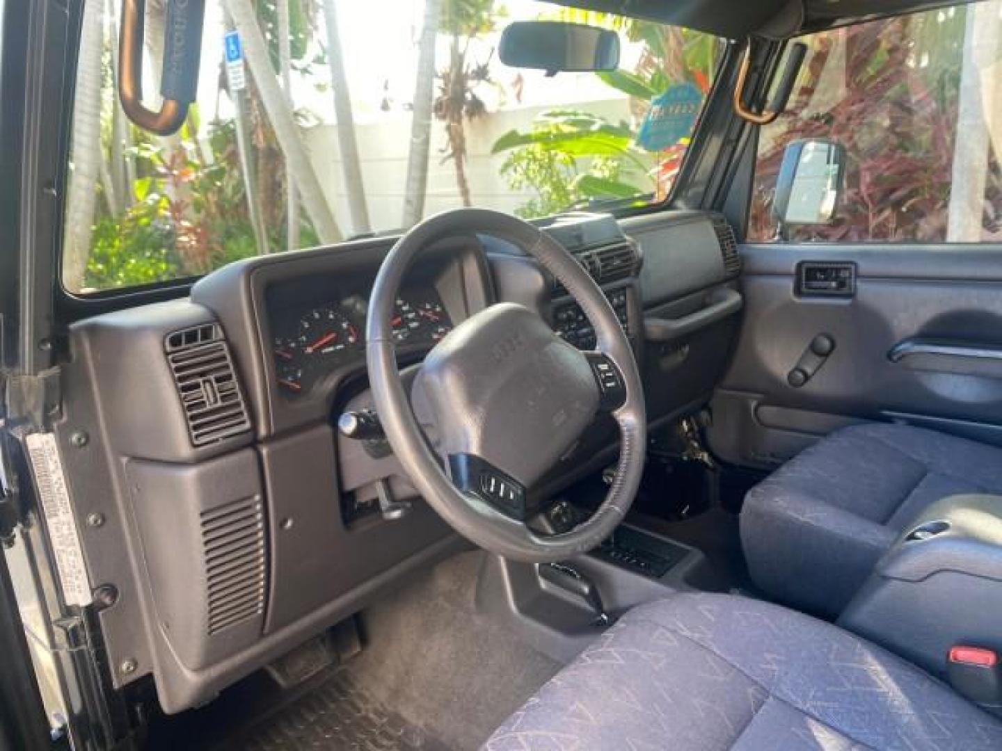 2001 Black /Agate Jeep Wrangler AUTO AC LOW MILES 77,760 HARD TOP (1J4FA49S61P) with an 4.0L SMFI I6 Power Tech Engine engine, Automatic transmission, located at 4701 North Dixie Hwy, Pompano Beach, FL, 33064, (954) 422-2889, 26.240938, -80.123474 - OUR WEBPAGE FLORIDACARS1.COM HAS OVER 100 PHOTOS AND FREE CARFAX LINK 2001 JEEP WRANGLER SPORT REMOVABLE HARD TOP VIN: 1J4FA49S61P364008 1 J 4 F A 4 9 S 6 1 P 3 6 4 0 0 8 UTILITY (BLAZER, JIMMY, SCOUT, ETC.) 4.0L I6 F GASOLINE REAR WHEEL DRIVE W/ 4X4 Features 4WD/AWD Air Conditioning Alloy Wheels AM - Photo#51