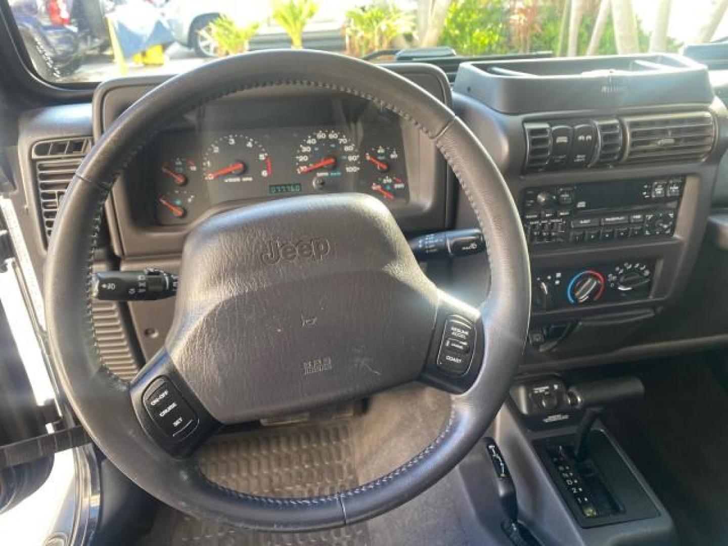 2001 Black /Agate Jeep Wrangler AUTO AC LOW MILES 77,760 HARD TOP (1J4FA49S61P) with an 4.0L SMFI I6 Power Tech Engine engine, Automatic transmission, located at 4701 North Dixie Hwy, Pompano Beach, FL, 33064, (954) 422-2889, 26.240938, -80.123474 - OUR WEBPAGE FLORIDACARS1.COM HAS OVER 100 PHOTOS AND FREE CARFAX LINK 2001 JEEP WRANGLER SPORT REMOVABLE HARD TOP VIN: 1J4FA49S61P364008 1 J 4 F A 4 9 S 6 1 P 3 6 4 0 0 8 UTILITY (BLAZER, JIMMY, SCOUT, ETC.) 4.0L I6 F GASOLINE REAR WHEEL DRIVE W/ 4X4 Features 4WD/AWD Air Conditioning Alloy Wheels AM - Photo#53