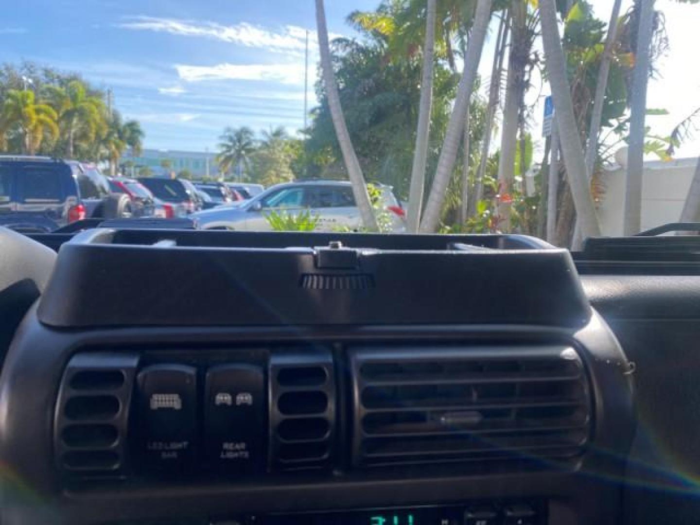 2001 Black /Agate Jeep Wrangler AUTO AC LOW MILES 77,760 HARD TOP (1J4FA49S61P) with an 4.0L SMFI I6 Power Tech Engine engine, Automatic transmission, located at 4701 North Dixie Hwy, Pompano Beach, FL, 33064, (954) 422-2889, 26.240938, -80.123474 - OUR WEBPAGE FLORIDACARS1.COM HAS OVER 100 PHOTOS AND FREE CARFAX LINK 2001 JEEP WRANGLER SPORT REMOVABLE HARD TOP VIN: 1J4FA49S61P364008 1 J 4 F A 4 9 S 6 1 P 3 6 4 0 0 8 UTILITY (BLAZER, JIMMY, SCOUT, ETC.) 4.0L I6 F GASOLINE REAR WHEEL DRIVE W/ 4X4 Features 4WD/AWD Air Conditioning Alloy Wheels AM - Photo#61