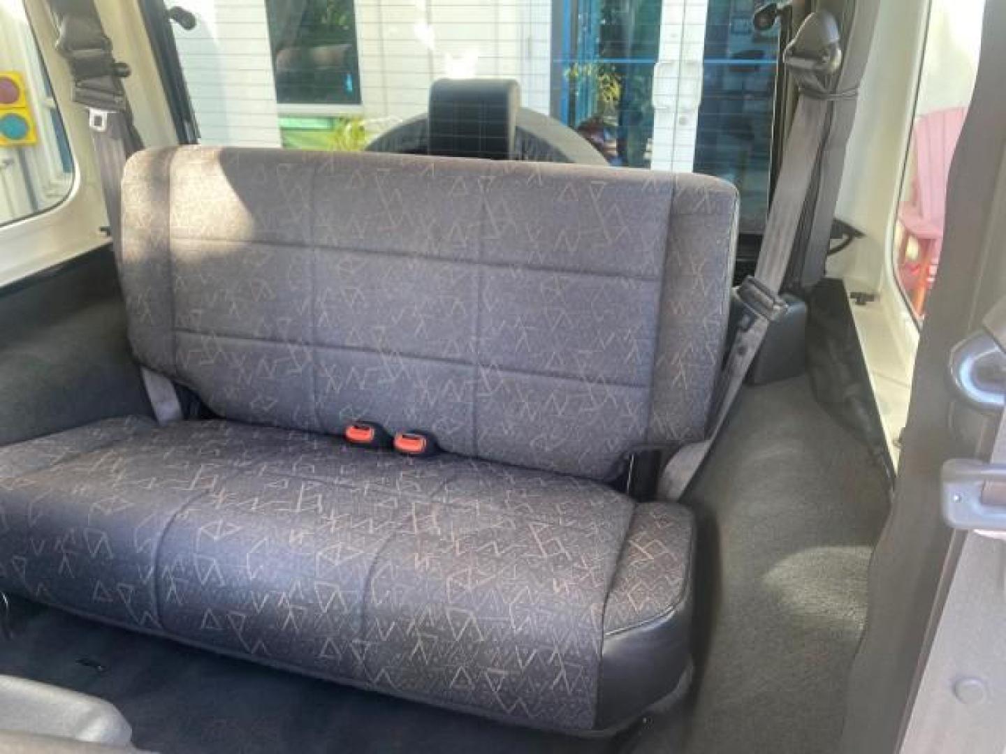 2001 Black /Agate Jeep Wrangler AUTO AC LOW MILES 77,760 HARD TOP (1J4FA49S61P) with an 4.0L SMFI I6 Power Tech Engine engine, Automatic transmission, located at 4701 North Dixie Hwy, Pompano Beach, FL, 33064, (954) 422-2889, 26.240938, -80.123474 - OUR WEBPAGE FLORIDACARS1.COM HAS OVER 100 PHOTOS AND FREE CARFAX LINK 2001 JEEP WRANGLER SPORT REMOVABLE HARD TOP VIN: 1J4FA49S61P364008 1 J 4 F A 4 9 S 6 1 P 3 6 4 0 0 8 UTILITY (BLAZER, JIMMY, SCOUT, ETC.) 4.0L I6 F GASOLINE REAR WHEEL DRIVE W/ 4X4 Features 4WD/AWD Air Conditioning Alloy Wheels AM - Photo#78