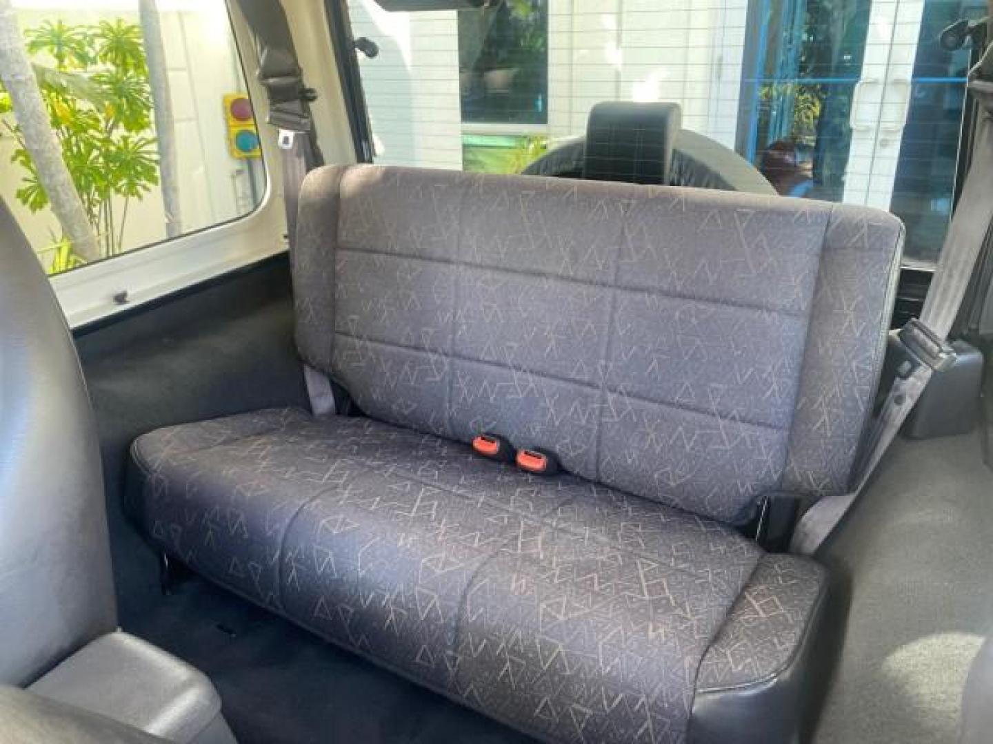 2001 Black /Agate Jeep Wrangler AUTO AC LOW MILES 77,760 HARD TOP (1J4FA49S61P) with an 4.0L SMFI I6 Power Tech Engine engine, Automatic transmission, located at 4701 North Dixie Hwy, Pompano Beach, FL, 33064, (954) 422-2889, 26.240938, -80.123474 - OUR WEBPAGE FLORIDACARS1.COM HAS OVER 100 PHOTOS AND FREE CARFAX LINK 2001 JEEP WRANGLER SPORT REMOVABLE HARD TOP VIN: 1J4FA49S61P364008 1 J 4 F A 4 9 S 6 1 P 3 6 4 0 0 8 UTILITY (BLAZER, JIMMY, SCOUT, ETC.) 4.0L I6 F GASOLINE REAR WHEEL DRIVE W/ 4X4 Features 4WD/AWD Air Conditioning Alloy Wheels AM - Photo#79