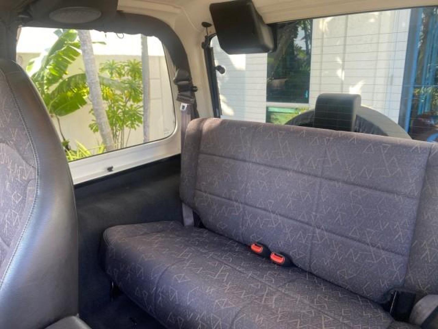 2001 Black /Agate Jeep Wrangler AUTO AC LOW MILES 77,760 HARD TOP (1J4FA49S61P) with an 4.0L SMFI I6 Power Tech Engine engine, Automatic transmission, located at 4701 North Dixie Hwy, Pompano Beach, FL, 33064, (954) 422-2889, 26.240938, -80.123474 - OUR WEBPAGE FLORIDACARS1.COM HAS OVER 100 PHOTOS AND FREE CARFAX LINK 2001 JEEP WRANGLER SPORT REMOVABLE HARD TOP VIN: 1J4FA49S61P364008 1 J 4 F A 4 9 S 6 1 P 3 6 4 0 0 8 UTILITY (BLAZER, JIMMY, SCOUT, ETC.) 4.0L I6 F GASOLINE REAR WHEEL DRIVE W/ 4X4 Features 4WD/AWD Air Conditioning Alloy Wheels AM - Photo#80