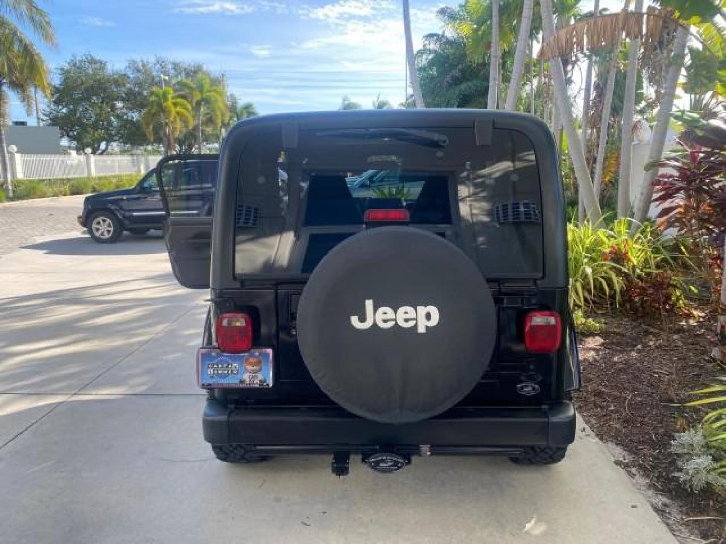 2001 Black /Agate Jeep Wrangler AUTO AC LOW MILES 77,760 HARD TOP (1J4FA49S61P) with an 4.0L SMFI I6 Power Tech Engine engine, Automatic transmission, located at 4701 North Dixie Hwy, Pompano Beach, FL, 33064, (954) 422-2889, 26.240938, -80.123474 - OUR WEBPAGE FLORIDACARS1.COM HAS OVER 100 PHOTOS AND FREE CARFAX LINK 2001 JEEP WRANGLER SPORT REMOVABLE HARD TOP VIN: 1J4FA49S61P364008 1 J 4 F A 4 9 S 6 1 P 3 6 4 0 0 8 UTILITY (BLAZER, JIMMY, SCOUT, ETC.) 4.0L I6 F GASOLINE REAR WHEEL DRIVE W/ 4X4 Features 4WD/AWD Air Conditioning Alloy Wheels AM - Photo#87