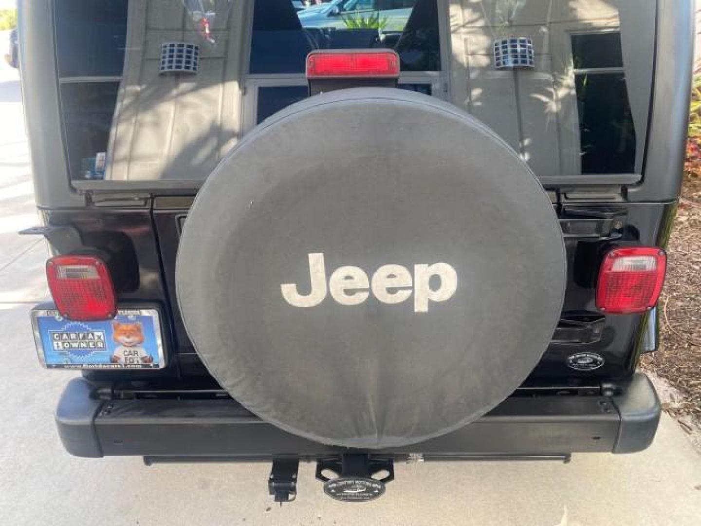 2001 Black /Agate Jeep Wrangler AUTO AC LOW MILES 77,760 HARD TOP (1J4FA49S61P) with an 4.0L SMFI I6 Power Tech Engine engine, Automatic transmission, located at 4701 North Dixie Hwy, Pompano Beach, FL, 33064, (954) 422-2889, 26.240938, -80.123474 - OUR WEBPAGE FLORIDACARS1.COM HAS OVER 100 PHOTOS AND FREE CARFAX LINK 2001 JEEP WRANGLER SPORT REMOVABLE HARD TOP VIN: 1J4FA49S61P364008 1 J 4 F A 4 9 S 6 1 P 3 6 4 0 0 8 UTILITY (BLAZER, JIMMY, SCOUT, ETC.) 4.0L I6 F GASOLINE REAR WHEEL DRIVE W/ 4X4 Features 4WD/AWD Air Conditioning Alloy Wheels AM - Photo#88