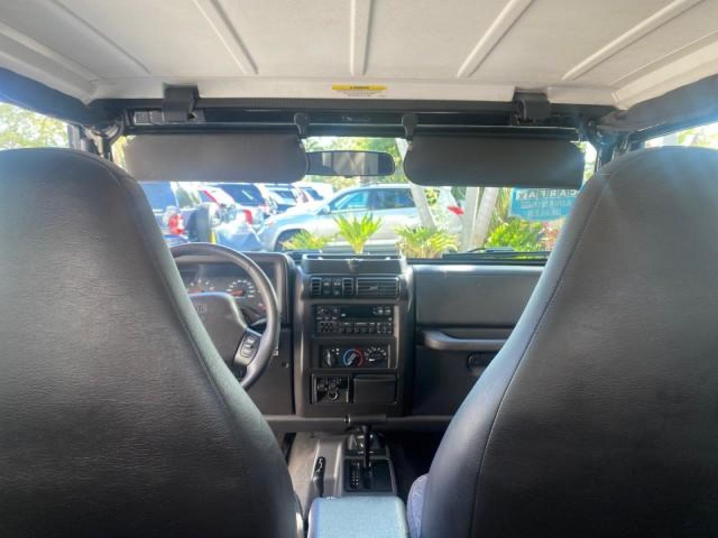 2001 Black /Agate Jeep Wrangler AUTO AC LOW MILES 77,760 HARD TOP (1J4FA49S61P) with an 4.0L SMFI I6 Power Tech Engine engine, Automatic transmission, located at 4701 North Dixie Hwy, Pompano Beach, FL, 33064, (954) 422-2889, 26.240938, -80.123474 - OUR WEBPAGE FLORIDACARS1.COM HAS OVER 100 PHOTOS AND FREE CARFAX LINK 2001 JEEP WRANGLER SPORT REMOVABLE HARD TOP VIN: 1J4FA49S61P364008 1 J 4 F A 4 9 S 6 1 P 3 6 4 0 0 8 UTILITY (BLAZER, JIMMY, SCOUT, ETC.) 4.0L I6 F GASOLINE REAR WHEEL DRIVE W/ 4X4 Features 4WD/AWD Air Conditioning Alloy Wheels AM - Photo#94