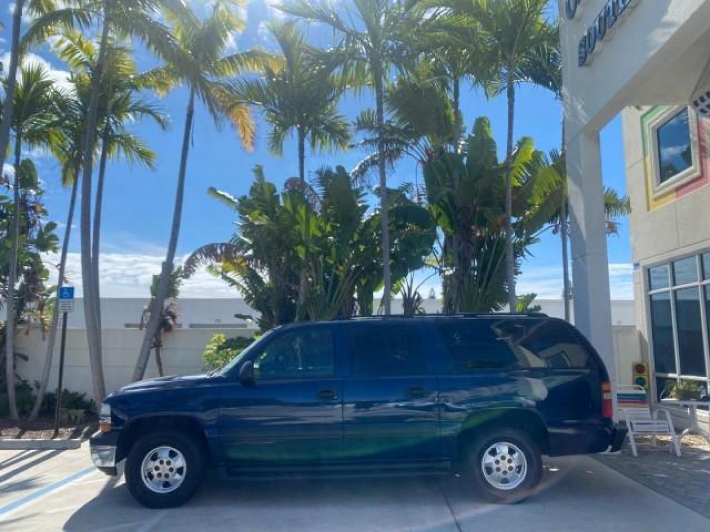 2003 Indigo Blue Metallic /Tan/Neutral Chevrolet Suburban LT 1 OWNER NO ACCIDENTS (1GNEC16Z13R) with an 5.3L Vortec 5300 V8 SFI Bi-Fuel Engine engine, Automatic transmission, located at 4701 North Dixie Hwy, Pompano Beach, FL, 33064, (954) 422-2889, 26.240938, -80.123474 - OUR WEBPAGE FLORIDACARS1.COM HAS OVER 100 PHOTOS AND FREE CARFAX LINK 2003 CHEVROLET SUBURBAN 1500 LS VIN: 1GNEC16Z13R307421 1 G N E C 1 6 Z 1 3 R 3 0 7 4 2 1 4 DOOR WAGON/SPORT UTILITY 5.3L V8 F FLEX FUEL 18 MPG REAR WHEEL DRIVE Features ABS Brakes Air Conditioning Alloy Wheels AM/FM Stereo Automat - Photo#4