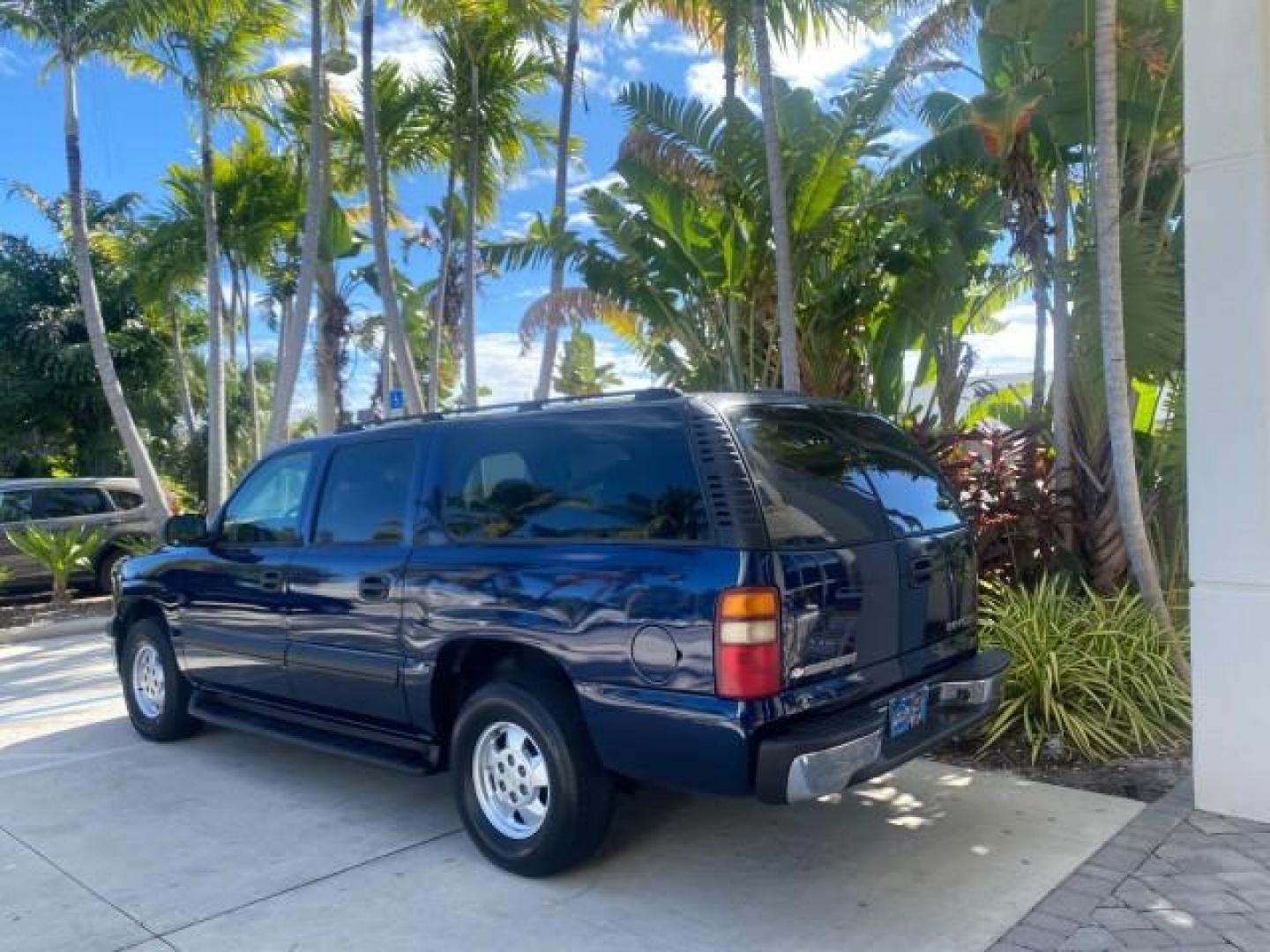 2003 Indigo Blue Metallic /Tan/Neutral Chevrolet Suburban LT 1 OWNER NO ACCIDENTS (1GNEC16Z13R) with an 5.3L Vortec 5300 V8 SFI Bi-Fuel Engine engine, Automatic transmission, located at 4701 North Dixie Hwy, Pompano Beach, FL, 33064, (954) 422-2889, 26.240938, -80.123474 - OUR WEBPAGE FLORIDACARS1.COM HAS OVER 100 PHOTOS AND FREE CARFAX LINK 2003 CHEVROLET SUBURBAN 1500 LS VIN: 1GNEC16Z13R307421 1 G N E C 1 6 Z 1 3 R 3 0 7 4 2 1 4 DOOR WAGON/SPORT UTILITY 5.3L V8 F FLEX FUEL 18 MPG REAR WHEEL DRIVE Features ABS Brakes Air Conditioning Alloy Wheels AM/FM Stereo Automat - Photo#5