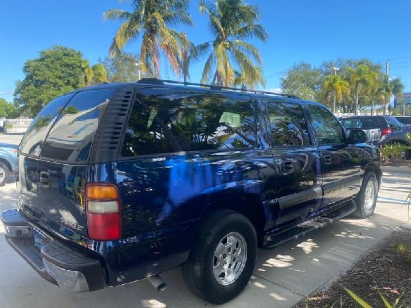 2003 Indigo Blue Metallic /Tan/Neutral Chevrolet Suburban LT 1 OWNER NO ACCIDENTS (1GNEC16Z13R) with an 5.3L Vortec 5300 V8 SFI Bi-Fuel Engine engine, Automatic transmission, located at 4701 North Dixie Hwy, Pompano Beach, FL, 33064, (954) 422-2889, 26.240938, -80.123474 - OUR WEBPAGE FLORIDACARS1.COM HAS OVER 100 PHOTOS AND FREE CARFAX LINK 2003 CHEVROLET SUBURBAN 1500 LS VIN: 1GNEC16Z13R307421 1 G N E C 1 6 Z 1 3 R 3 0 7 4 2 1 4 DOOR WAGON/SPORT UTILITY 5.3L V8 F FLEX FUEL 18 MPG REAR WHEEL DRIVE Features ABS Brakes Air Conditioning Alloy Wheels AM/FM Stereo Automat - Photo#7